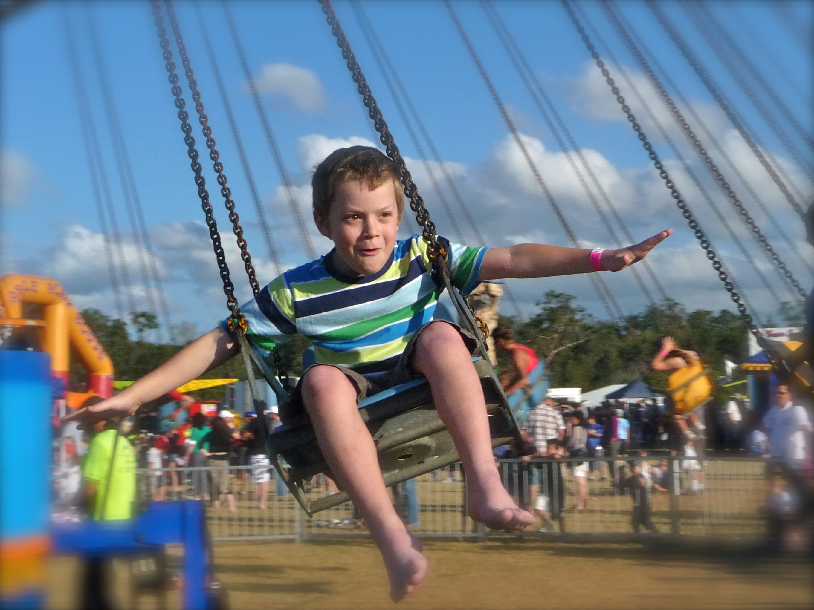 young, child, movement, daytime, flight, smiling, emotion, happiness, women, real people, outdoors, flying, joy, positive emotion, happy, amusement park ride, HD Wallpaper