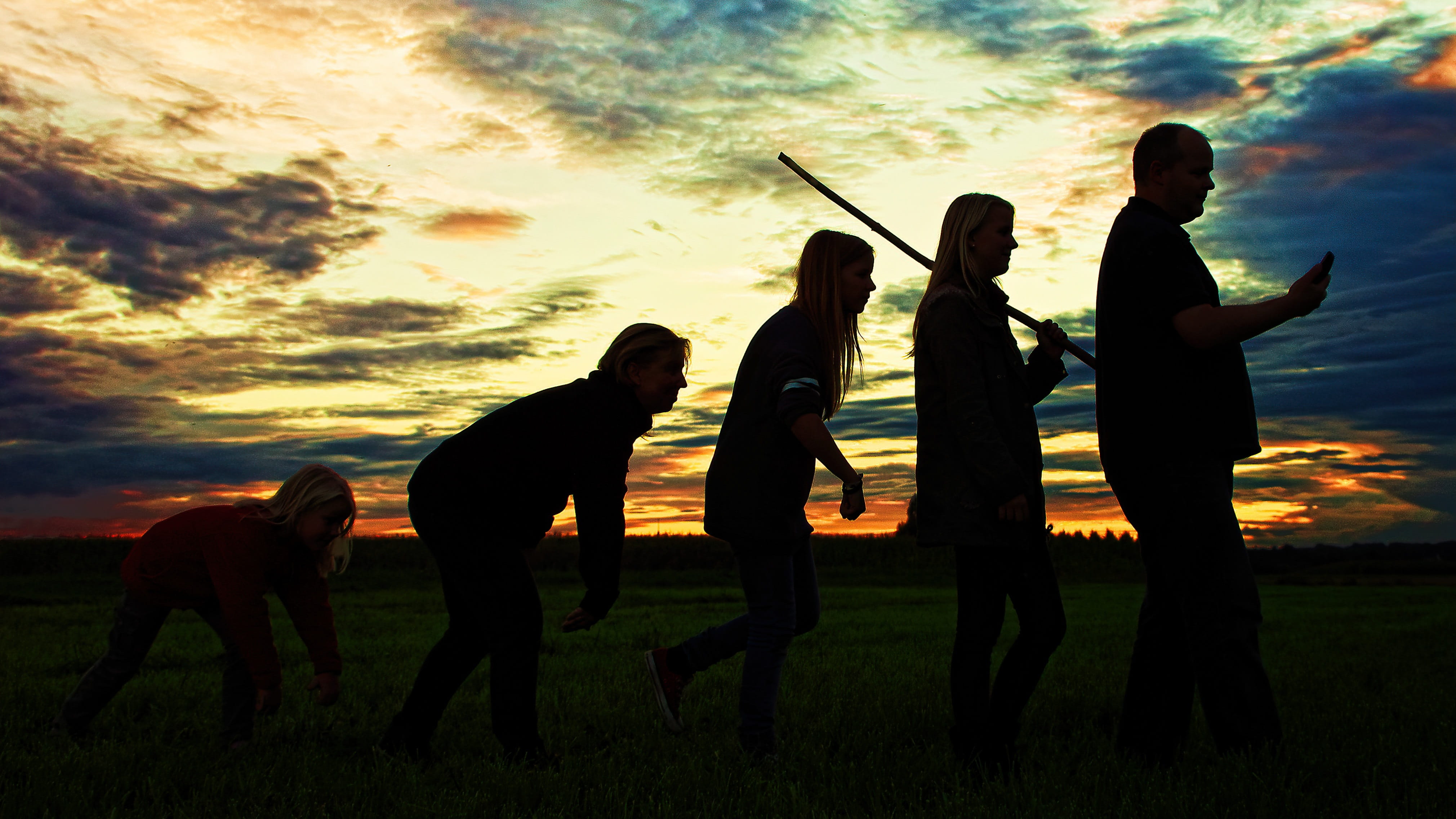 cloud - sky, real people, women, nature, arms raised, land, sunset, 4K, grass, friendship, people, men, woman, field, humor, outdoors, orange color, evolution, HD Wallpaper