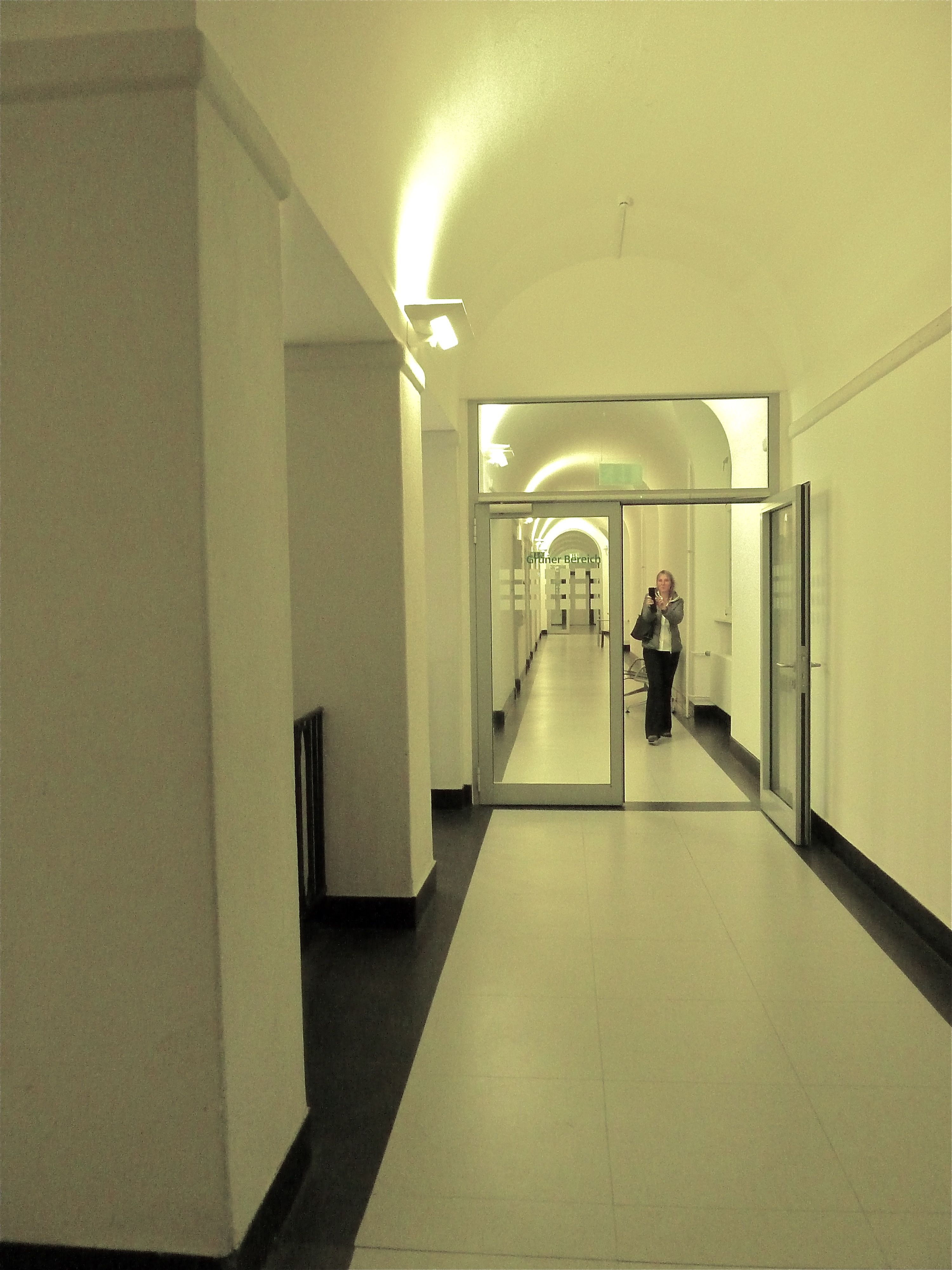 walking, arcade, typical german, corridor, lighting equipment, officials, real people, illuminated, built structure, direction, building, indoors, men, Phone HD Wallpaper