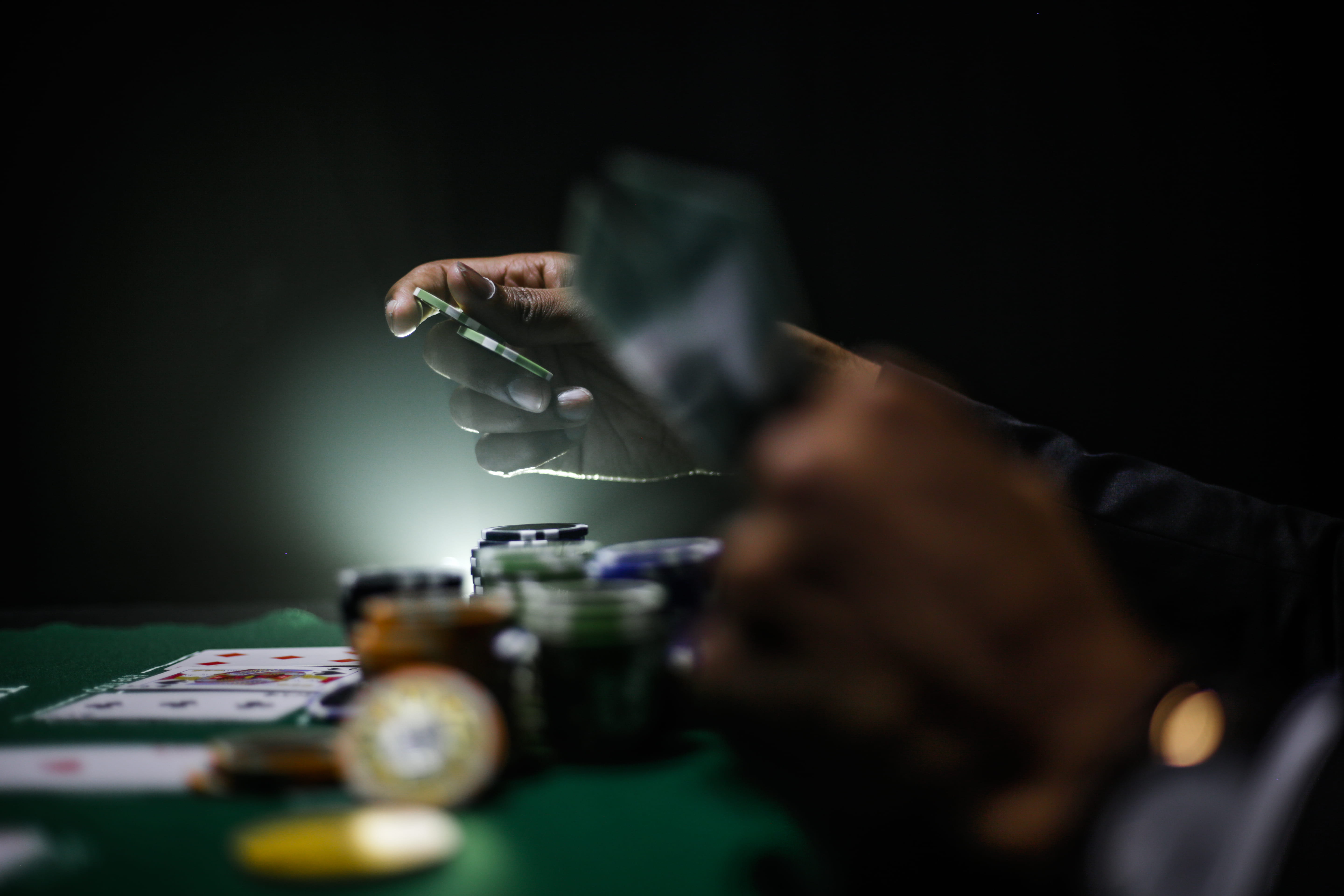 business, one person, cards, occupation, expertise, indoors, men, close-up, holding, light, 5K, skill, technology, poker, betting, deal, table, playing, HD Wallpaper