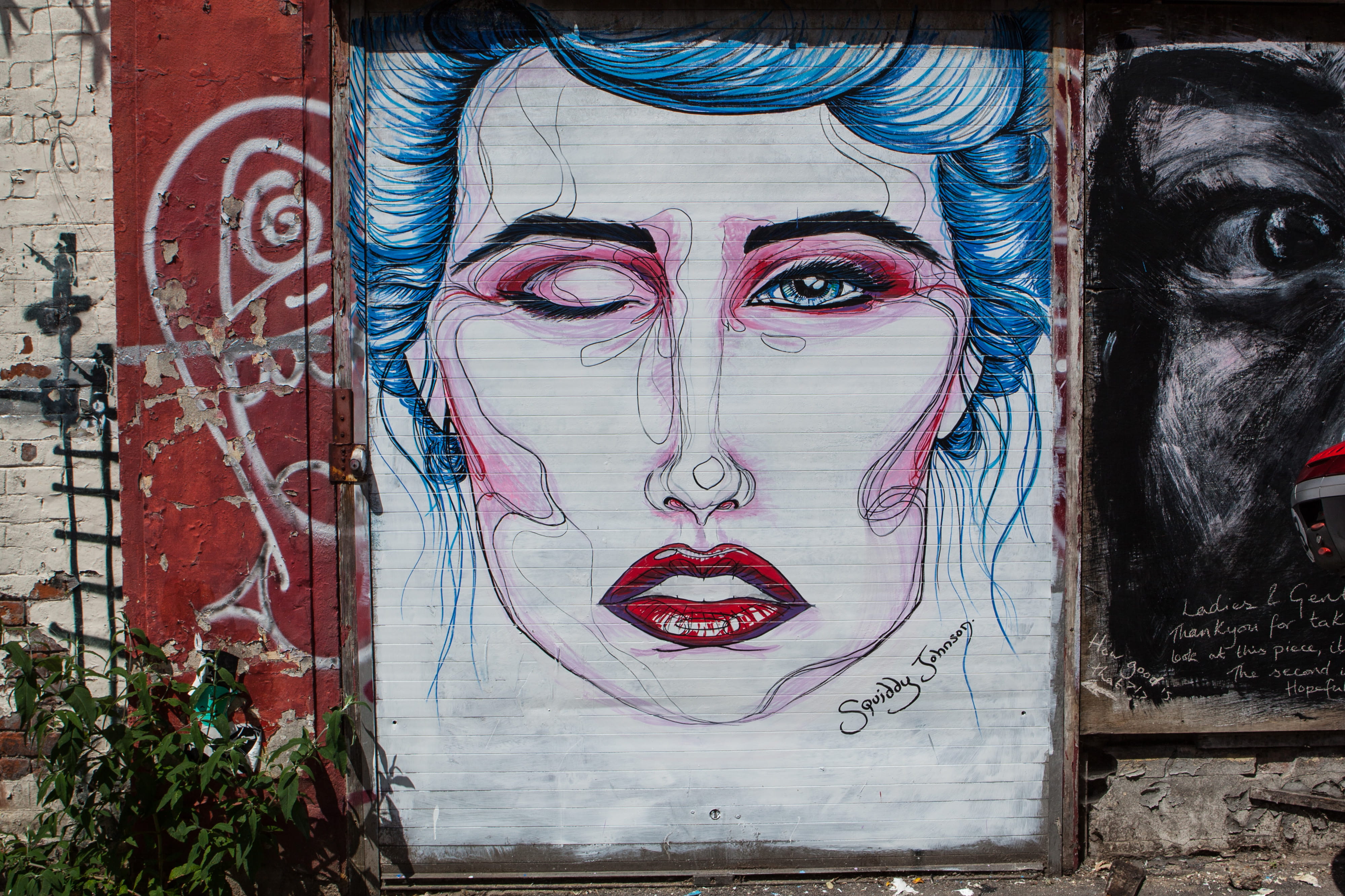 captured, architecture, day, portrait, DSLR, female likeness, east, graffiti, street, photo, human body part, wall, Street art, building exterior, outdoors, HD Wallpaper