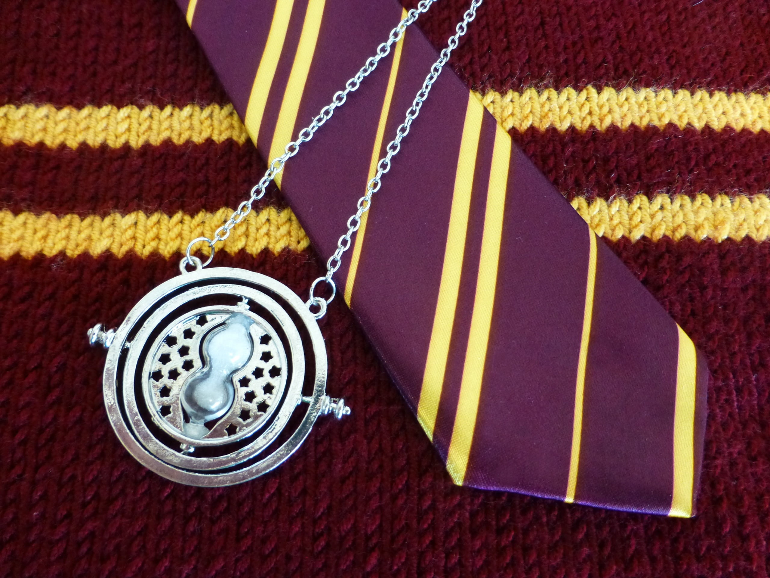 indoors, house colours, pendant, shape, pattern, harry potter, gold colored, jewelry, golden, time, clock, gold, day, luxury, silver, high angle view, time turner, HD Wallpaper