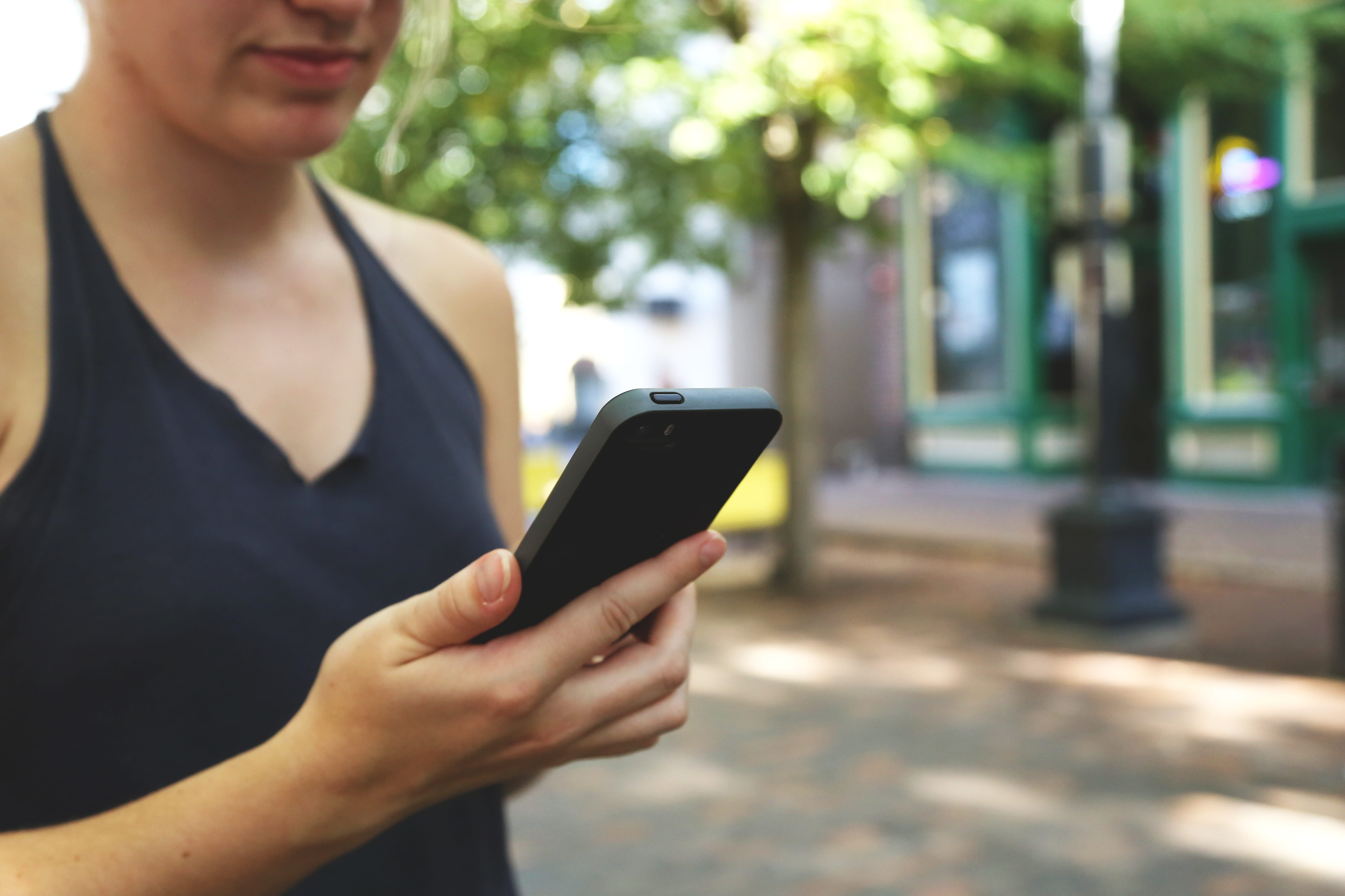 holding, modern, mobile, display, smart, day, architecture, business, communication, outdoors, technology, gadget, city, 5K, wireless technology, call, HD Wallpaper