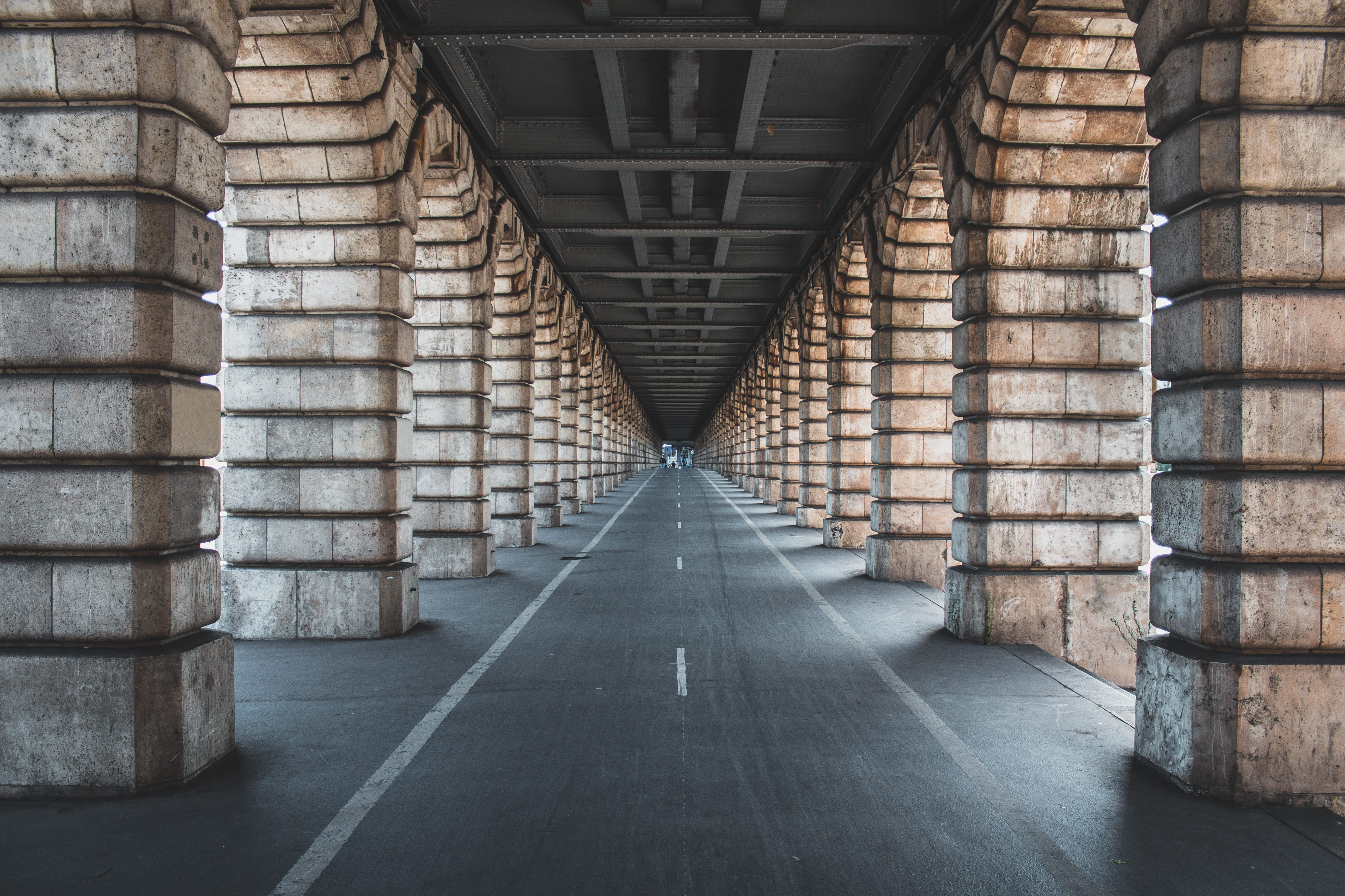symbol, columns, diminishing perspective, connection, pedestal, built structure, in a row, colonnade, building, bridge, hallway, architecture, day, repetition, HD Wallpaper