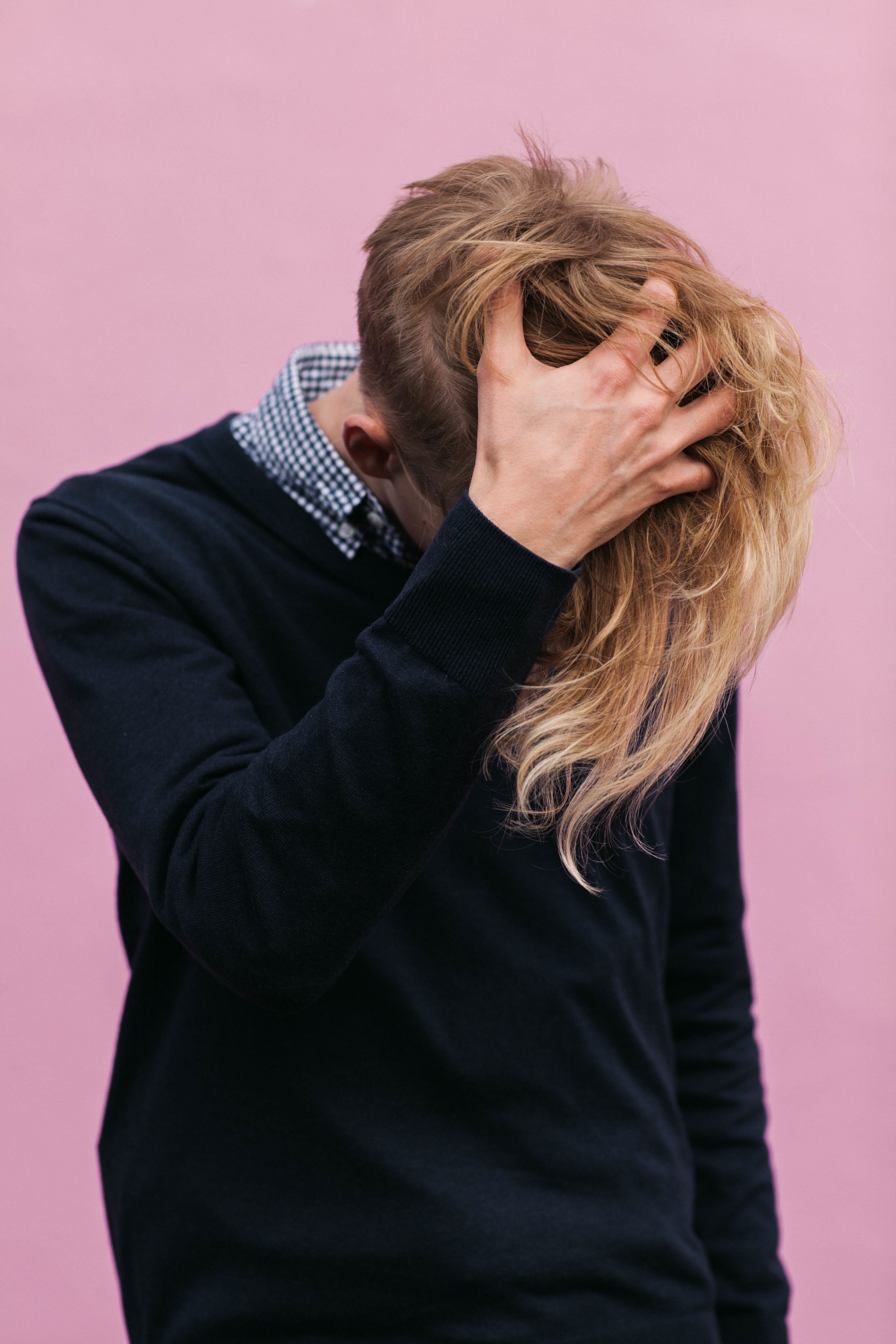 wall - building feature, wearing, women, blonde, obscured face, people, hair, black, depression - Sadness, standing, daytime, colored background, blonde hair, Phone HD Wallpaper