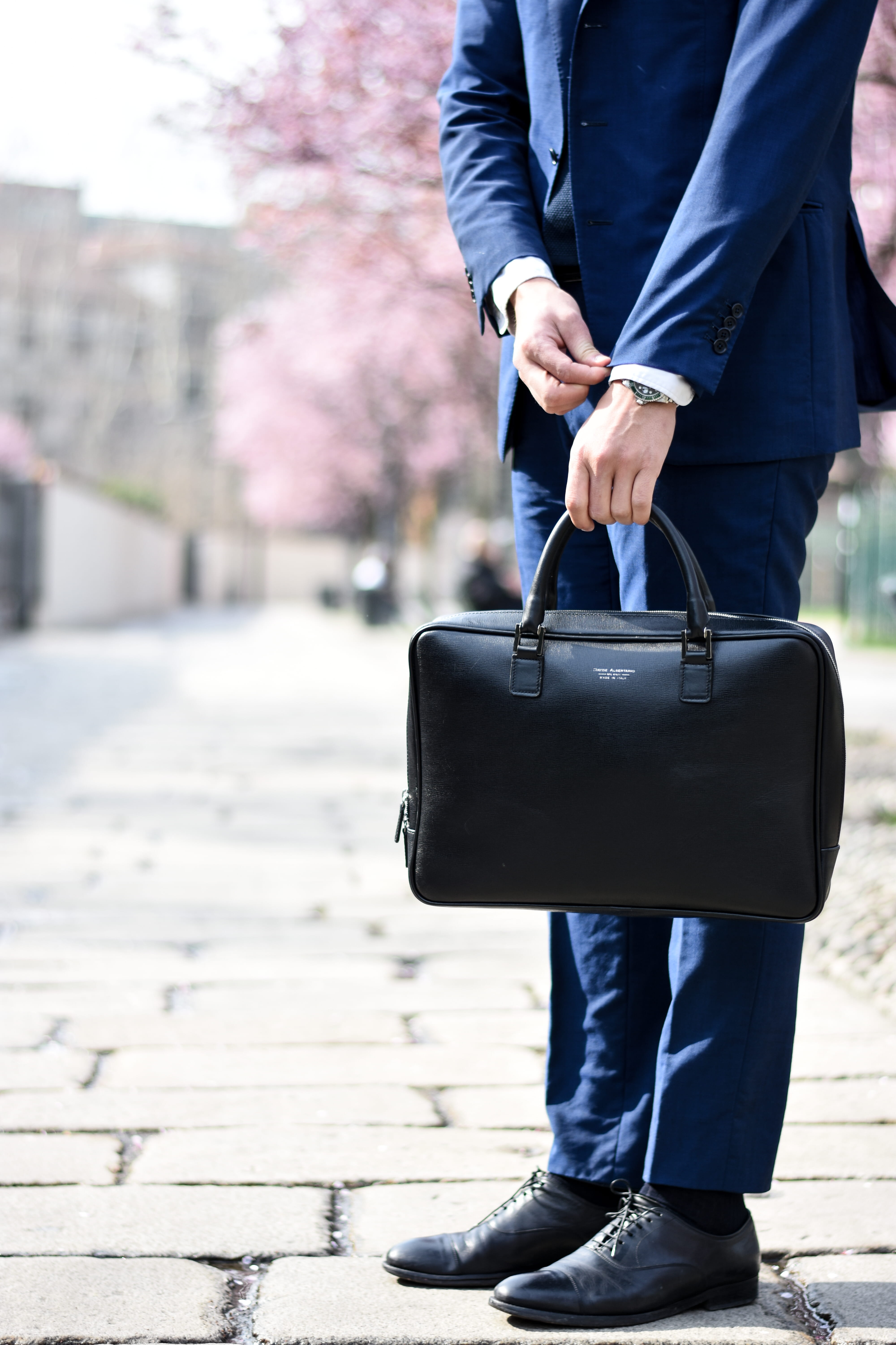 briefcase, daytime, black, male, one person, man, luggage, footpath, holding, shoes, standing, human body part, pair, focus on foreground, outdoors, low section, Phone HD Wallpaper