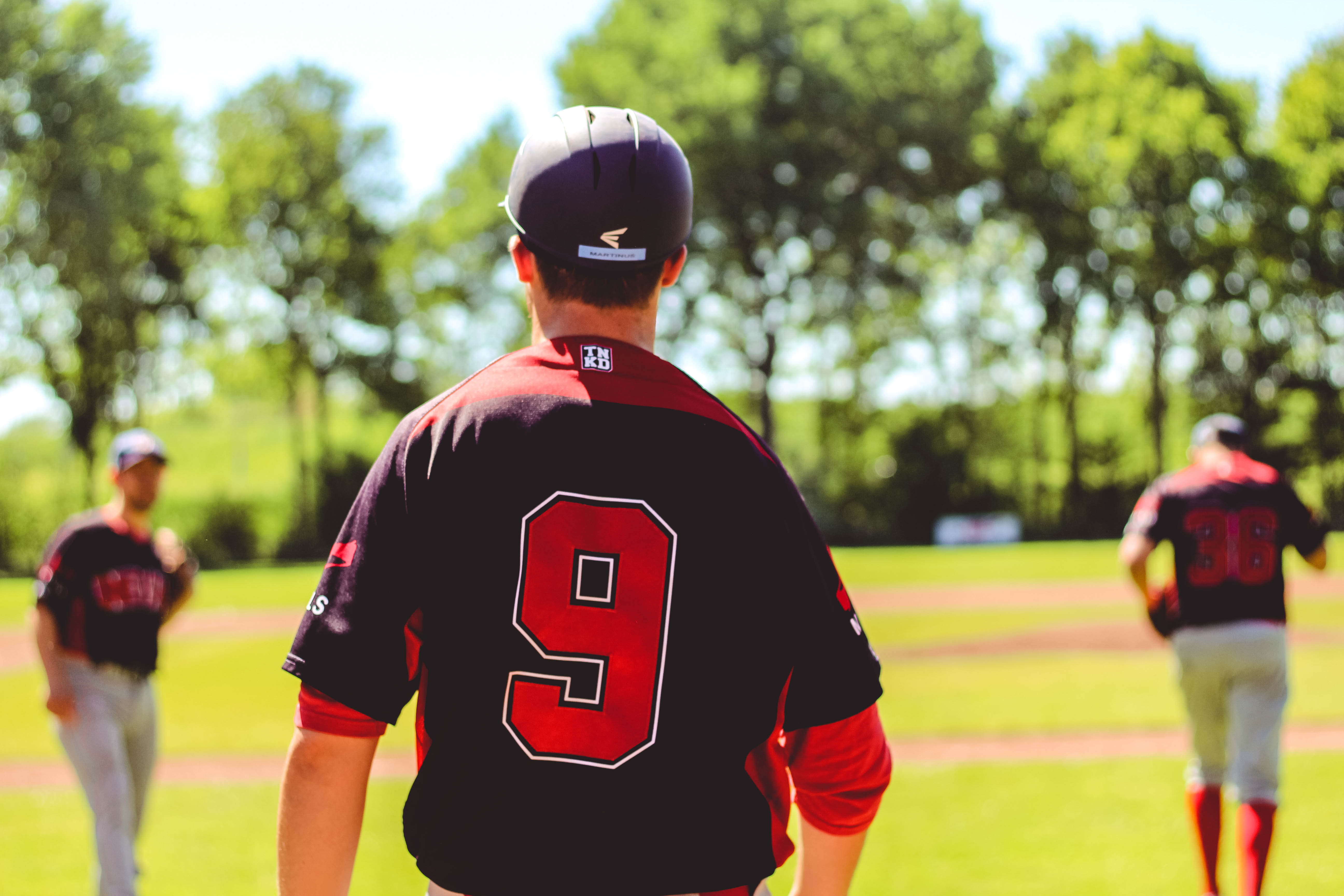 fun, grass, focus on foreground, recreation, uniform, action, green, day, team, man, 5K, shallow, athlete, baseball players, number, athletes, sports uniform, HD Wallpaper
