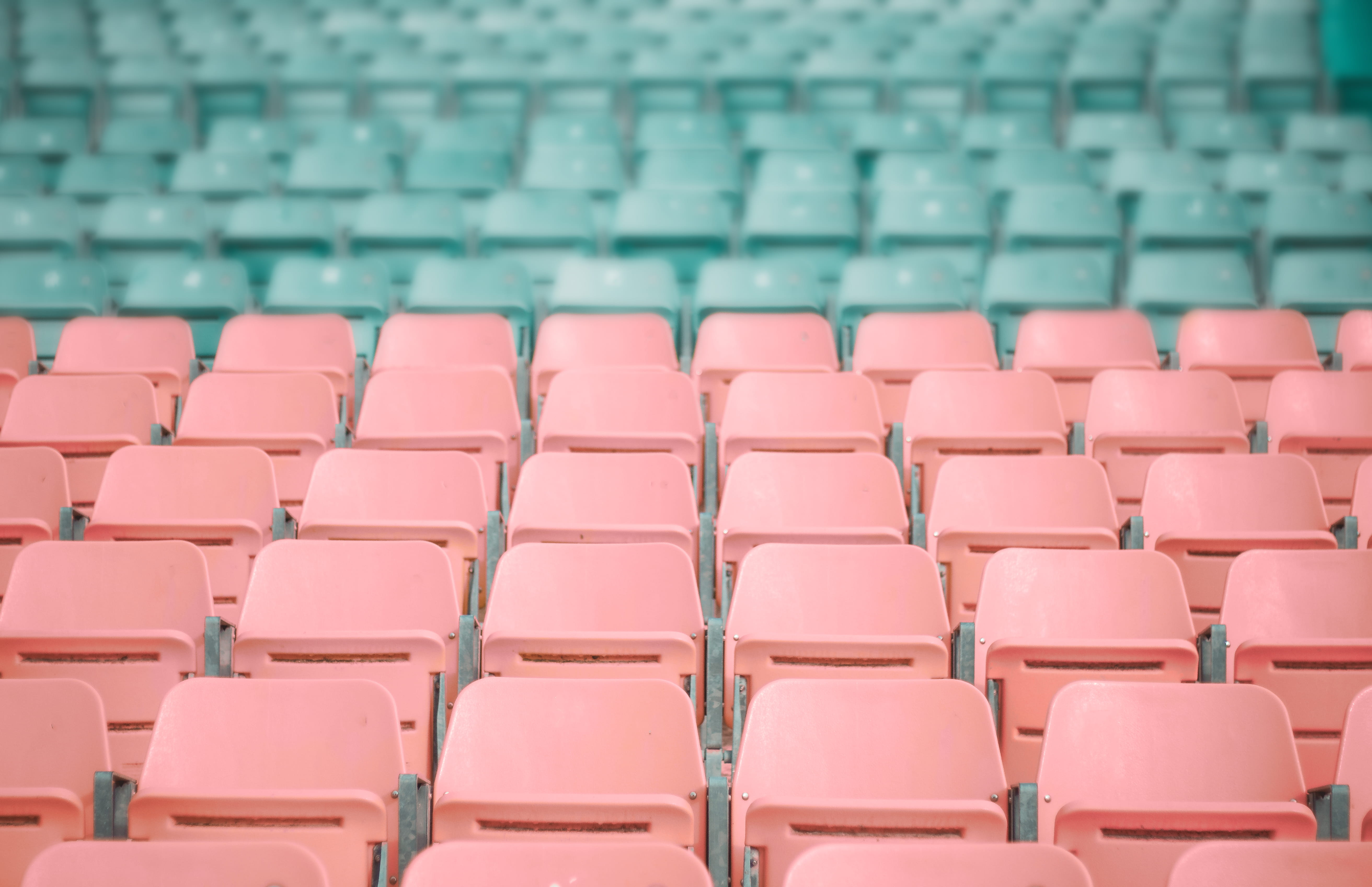side by side, chair, seats, blue, orange color, empty, bleachers, large group of objects, no people, in a row, backgrounds, repetition, chairs, pink, absence, HD Wallpaper