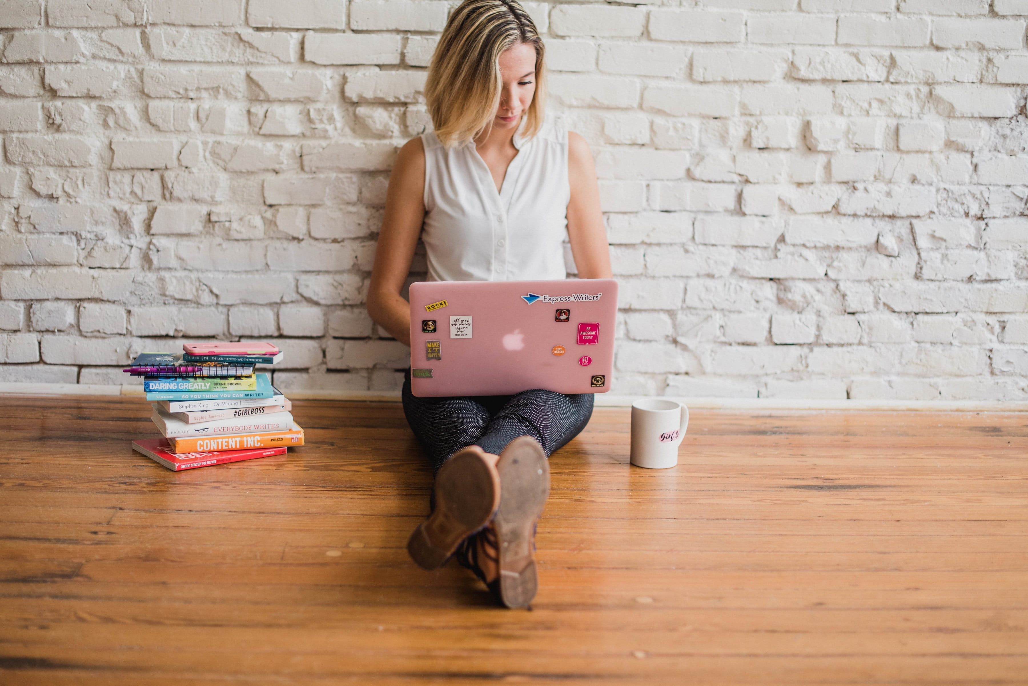 blond hair, flooring, written, one person, brick, content marketing, indoors, wall, writing, brick wall, front view, young women, handwriting, wood, wall - building feature, HD Wallpaper