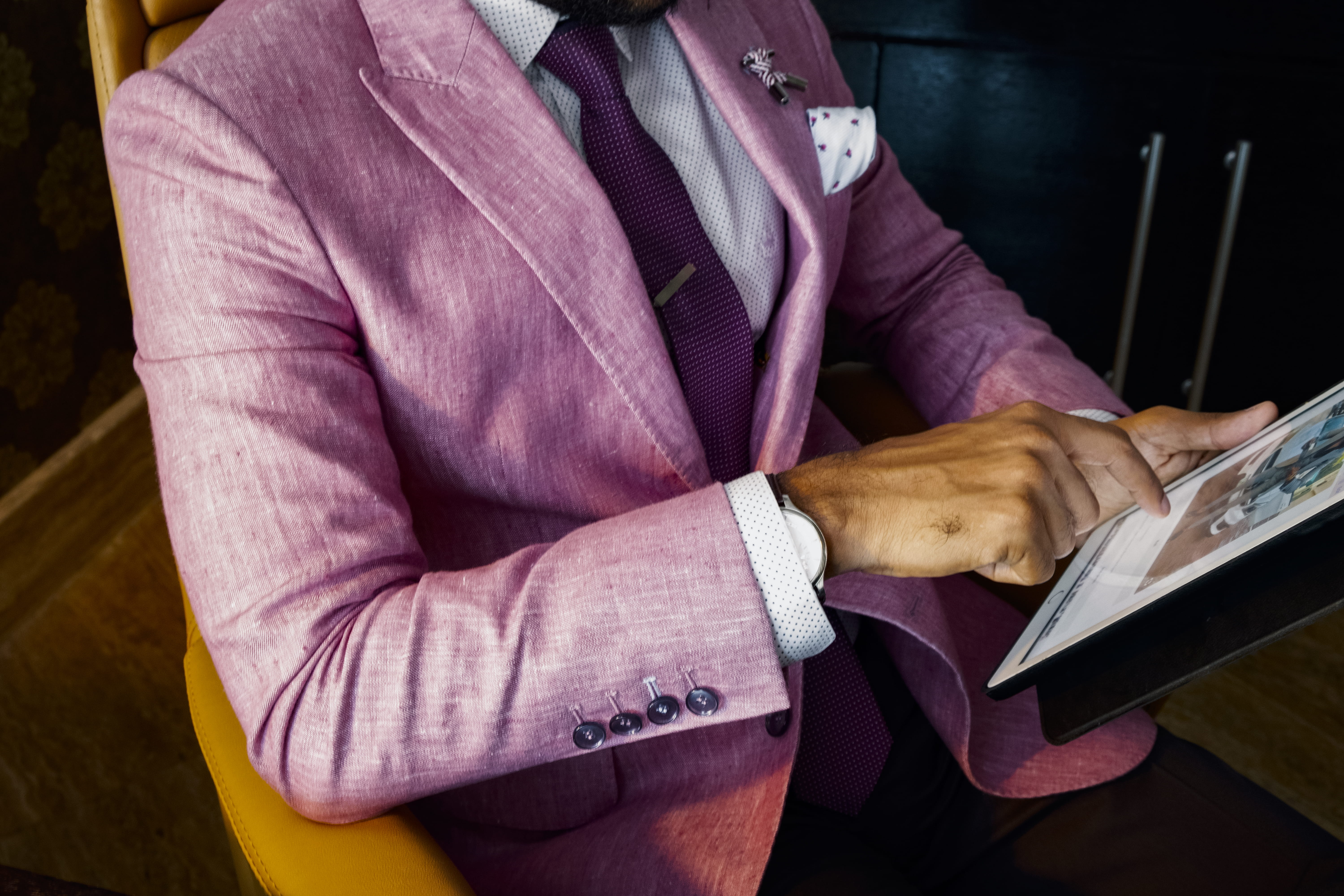 menswear, looking, one person, pink, tie, adult, close-up, currency, corporate attire, chair, business person, tablet, finance, furniture, wearing, designer suit, HD Wallpaper