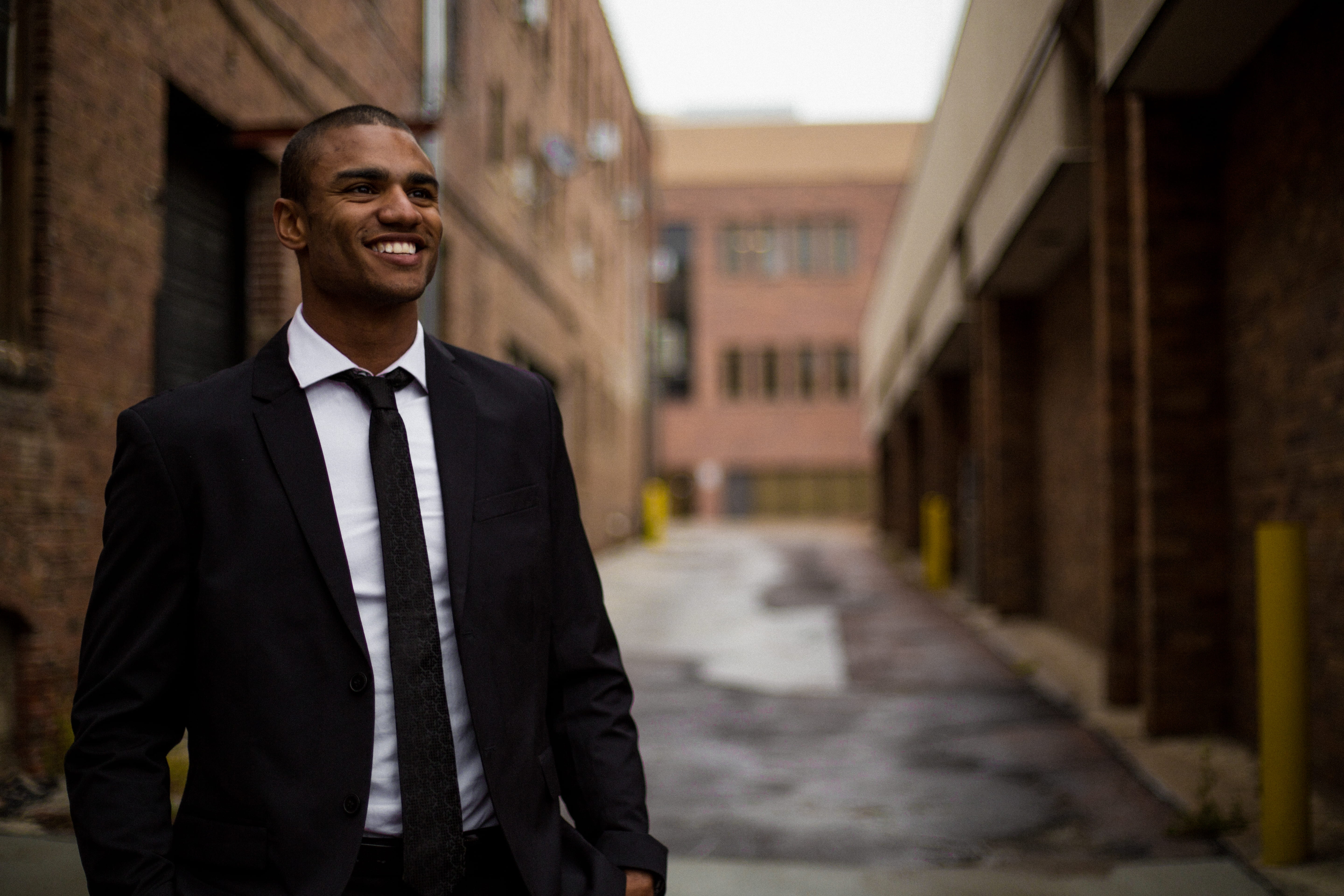 jacket, business person, buildings, waist up, one person, cheerful, corporate business, architecture, black, businessman, business, happiness, 5K, happy, HD Wallpaper