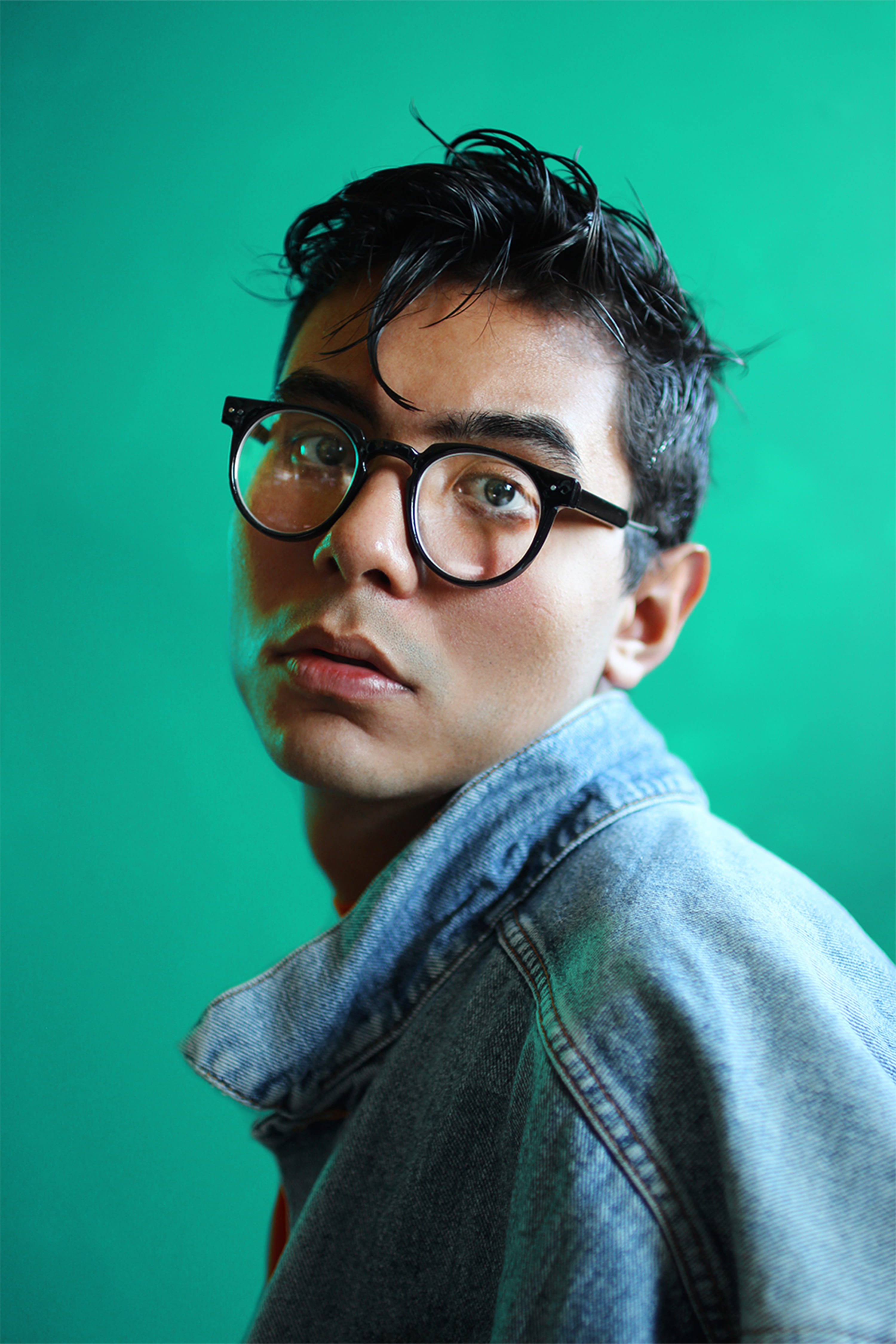 standing, black, glasses, turquoise colored, wearing, lifestyles, jean, style, colored background, s, blue, la, one person, man, face, young men, guy, waist up, Phone HD Wallpaper
