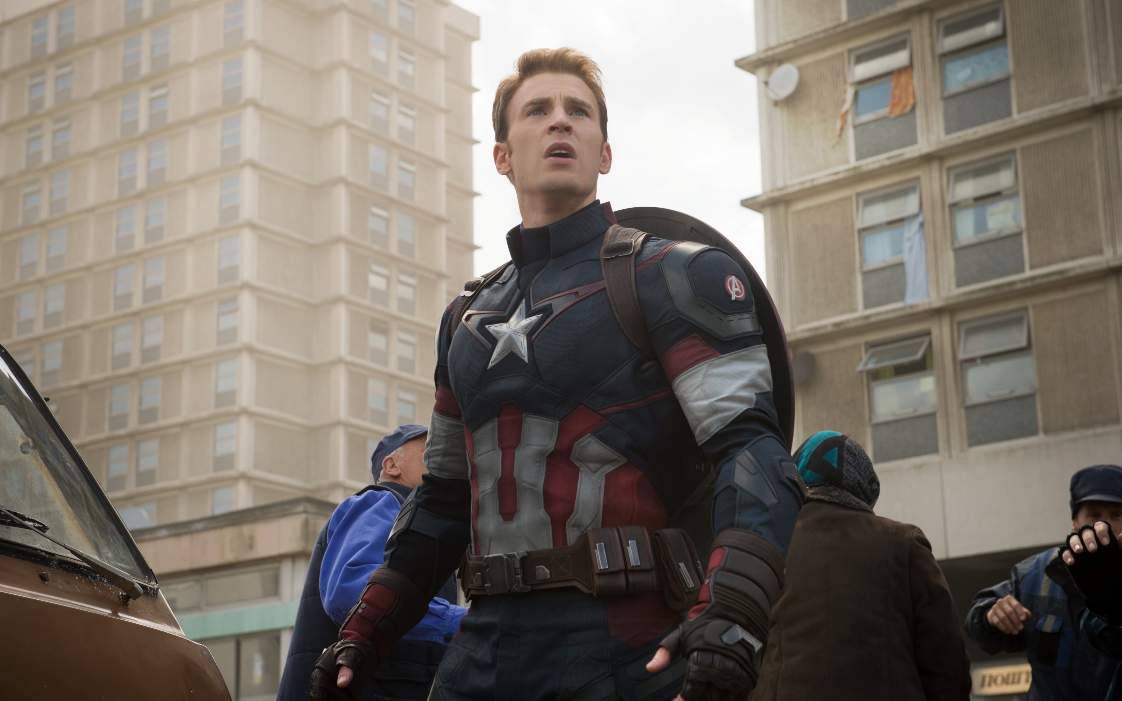 low angle view, chris, hollywood, evan, standing, chris evans, office building exterior, young adult, skyscraper, built structure, casual clothing, city, HD Wallpaper