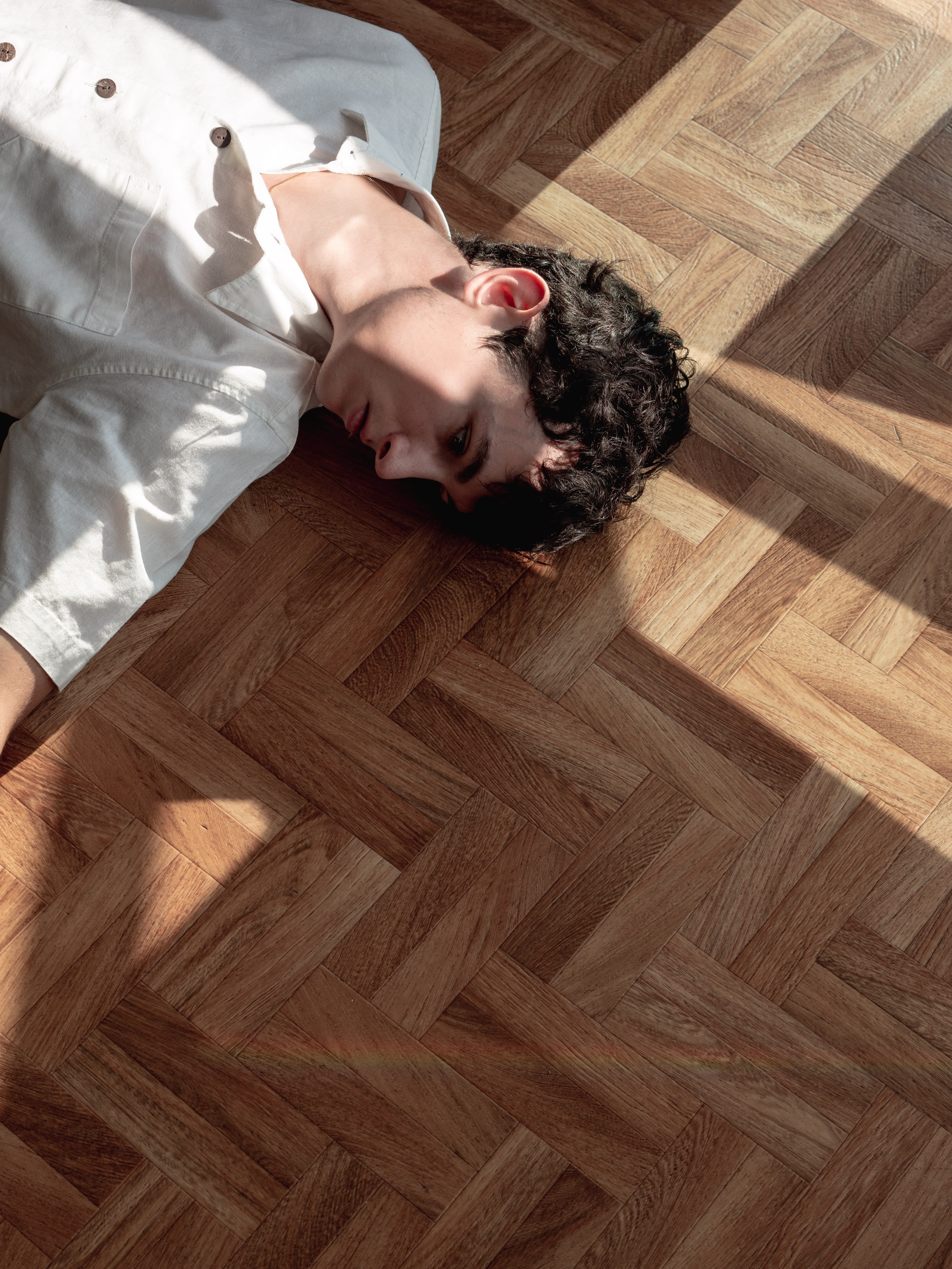 floor, male, one Person, lying Down, collared, smiling, shadow, caucasian Ethnicity, males, directly Above, indoors, one Man Only, white shirt, male Beauty, Phone HD Wallpaper