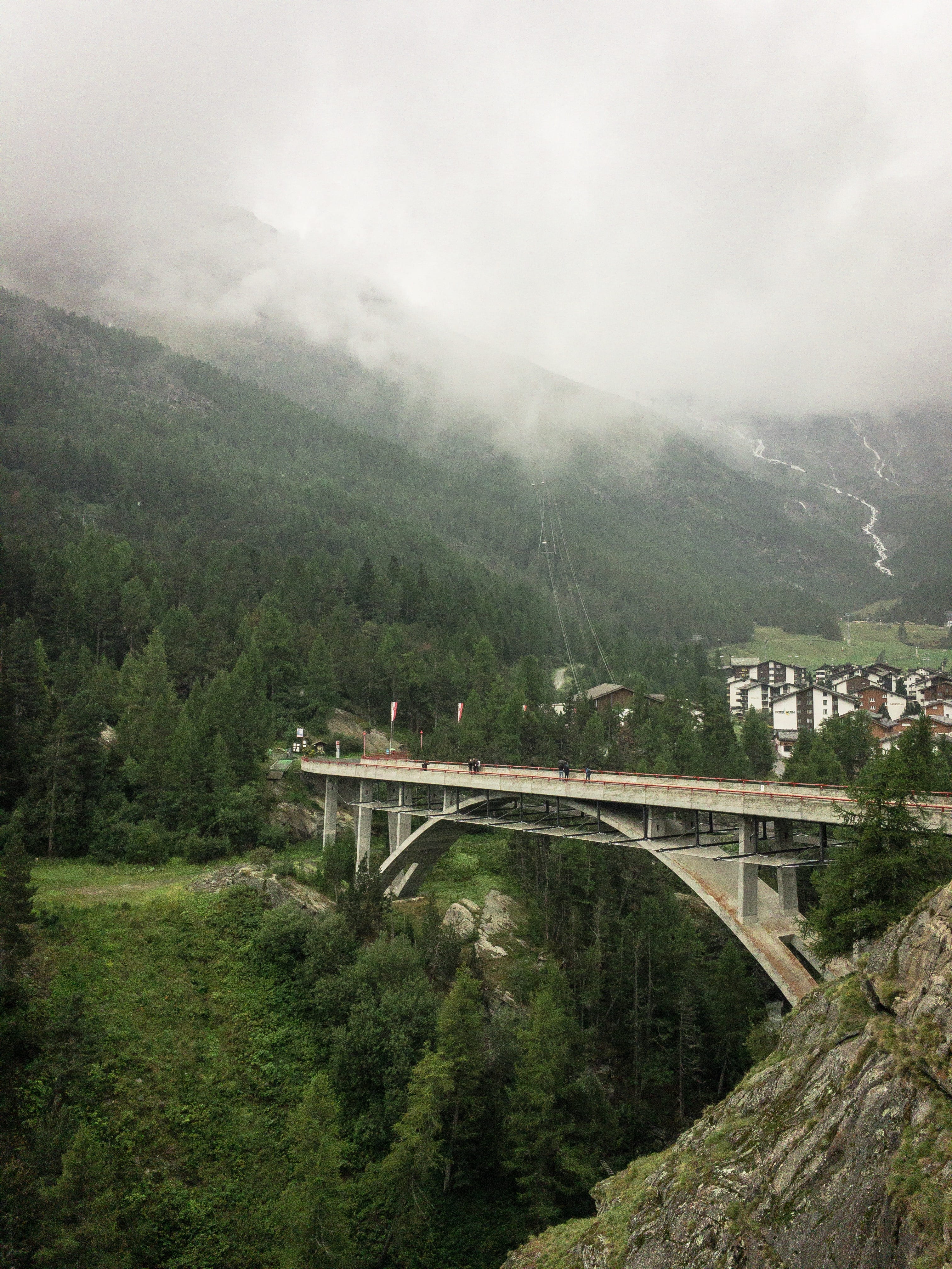 nature, connection, transportation, arch bridge, outdoors, bridge, fog, high angle view, switzerland, trees, bridge - man made structure, plant, saas fee, Phone HD Wallpaper