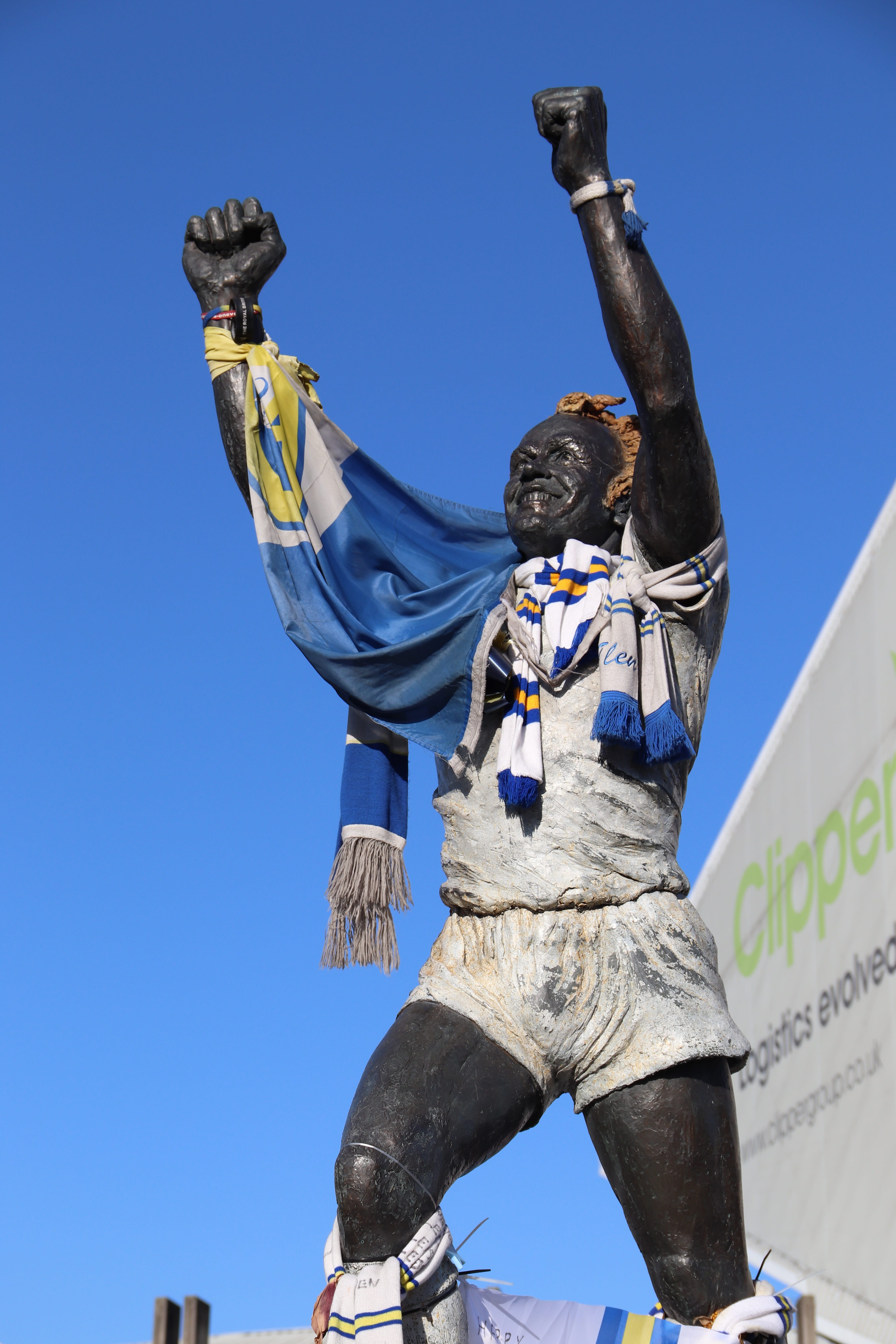 one person, text, patriotism, football, sunlight, nature, england, bremner, communication, clear sky, human arm, sculpture, sky, outdoors, yorkshire, billy, Phone HD Wallpaper