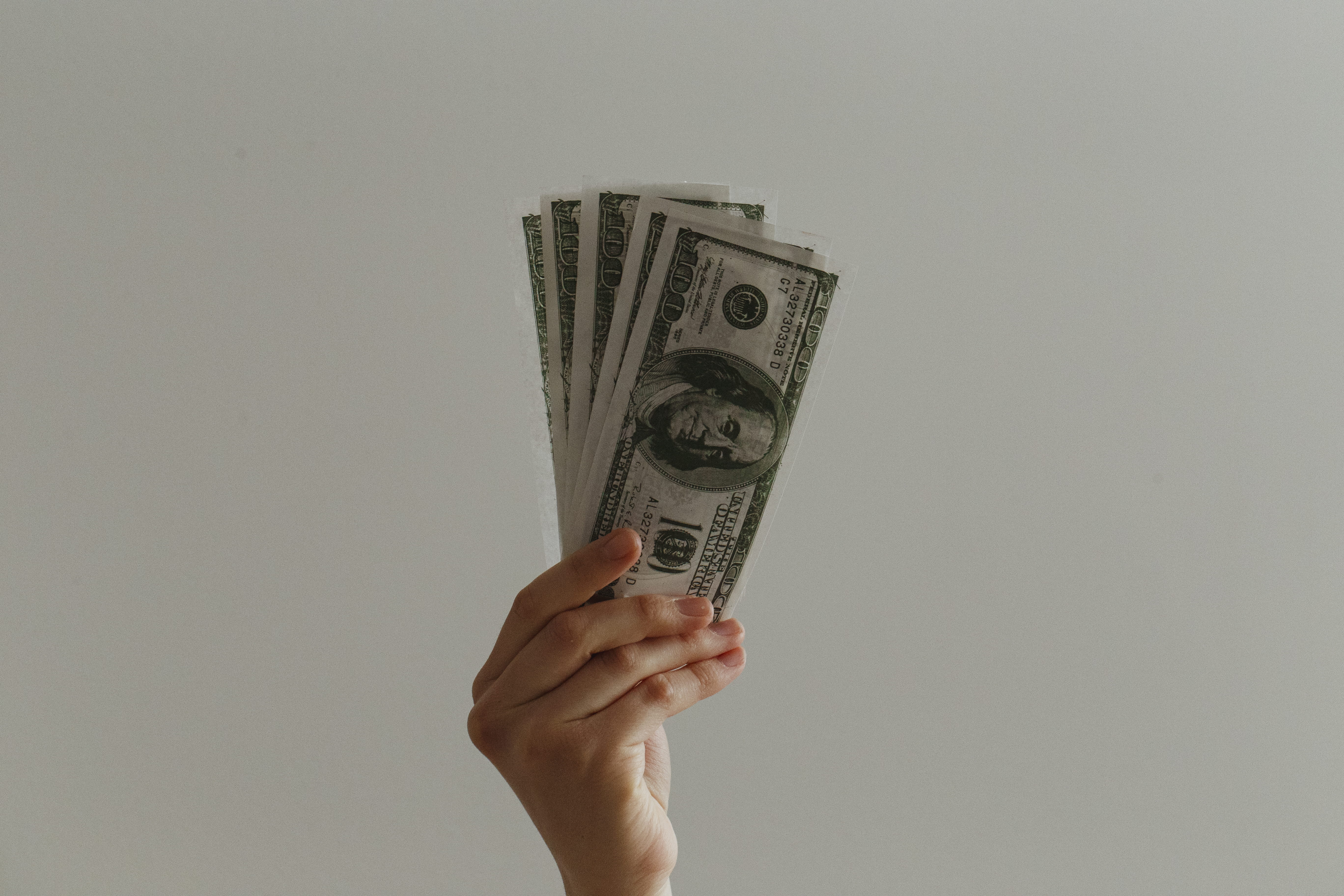 one person, us dollars, cut out, hand, candle, dollars, economy, dollar, buying, burning, business, us bills, studio shot, 5K, venture fund, savings, white background, HD Wallpaper