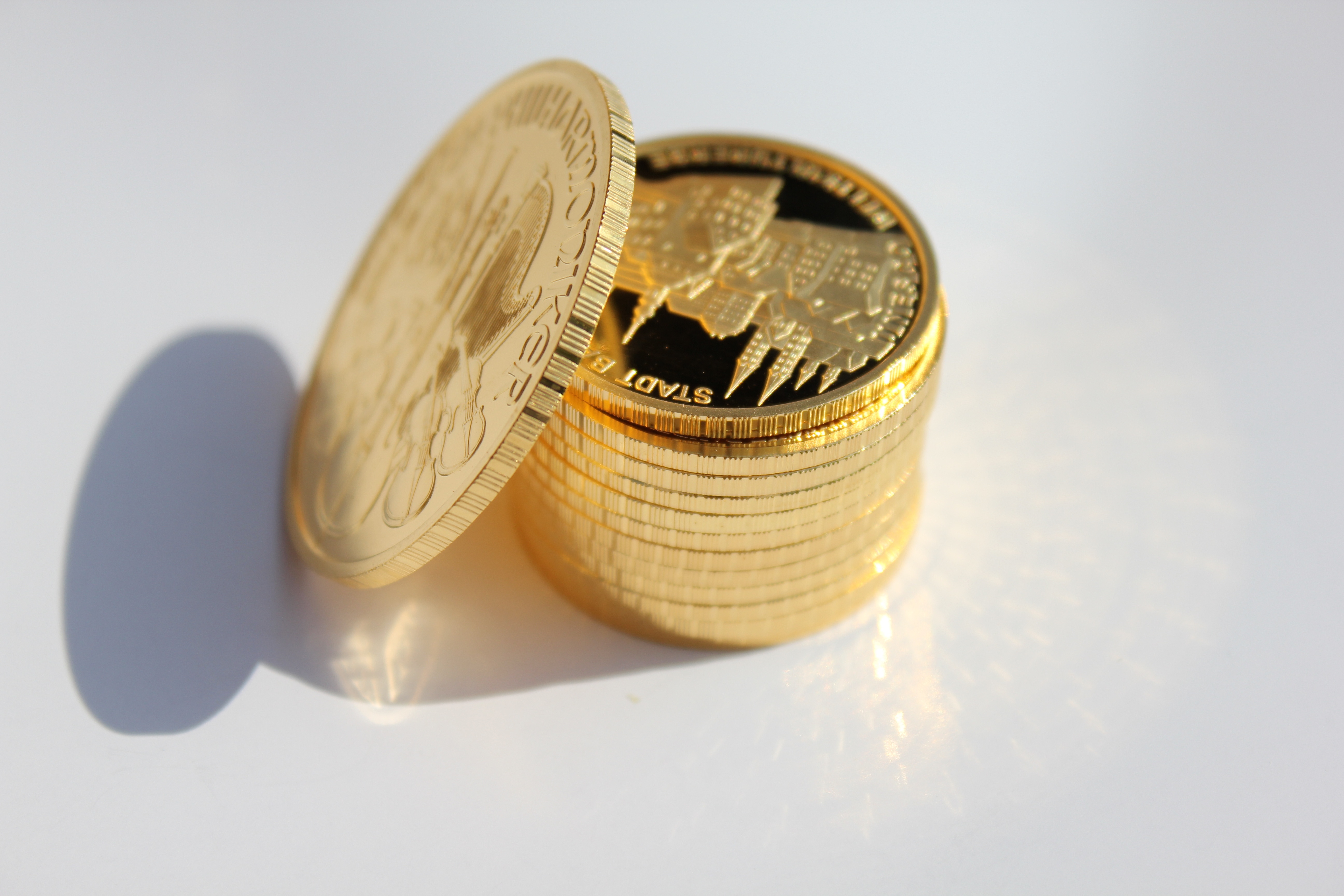 studio shot, coins, gold coin, metal, colored, reflection, shadow, economy, stack, wealth, indoors, 5K, white background, investment, savings, still life, HD Wallpaper