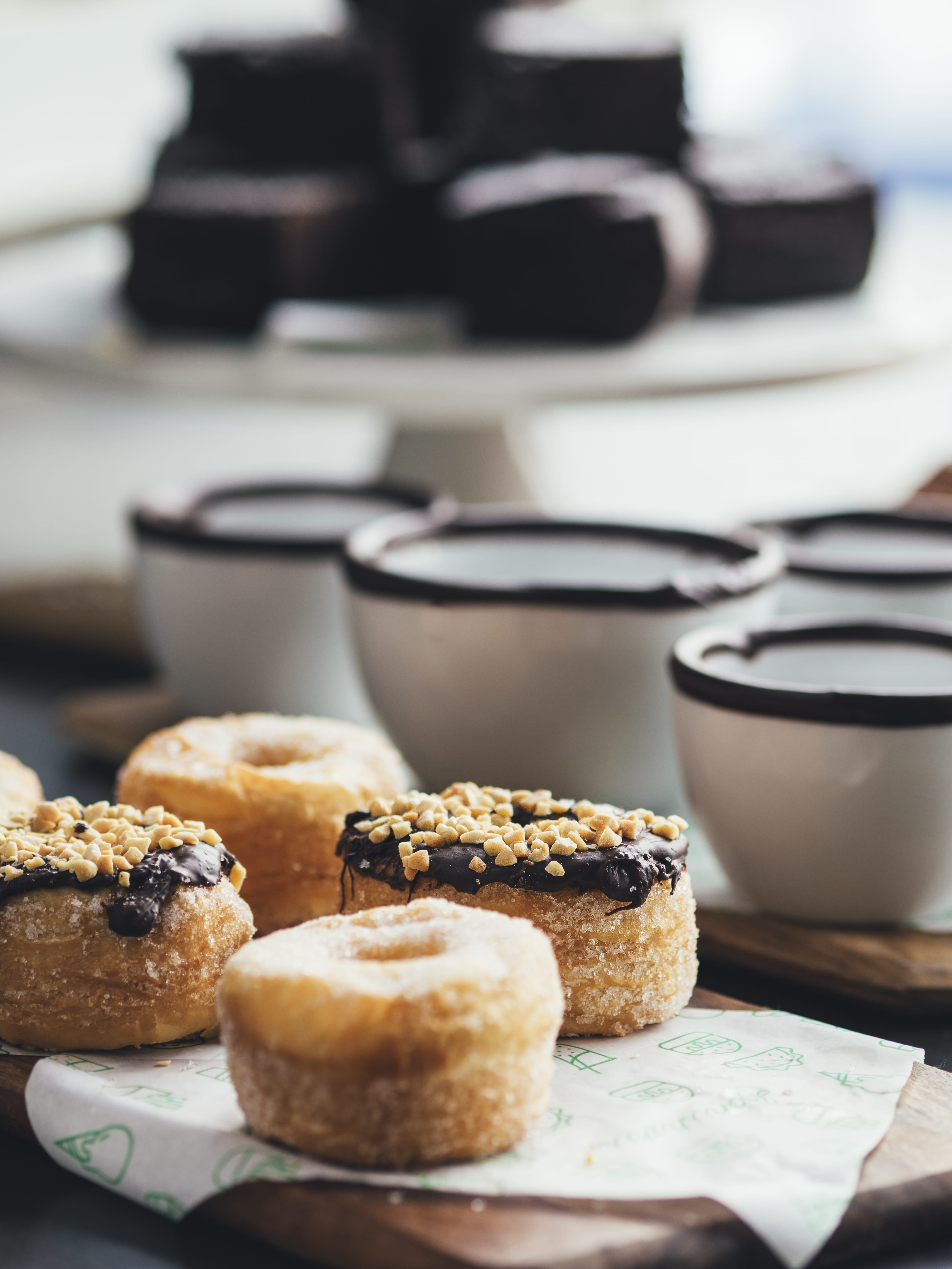 indoors, cup, focus, tray, focus on foreground, table, nut, circle, freshness, breakfast, mug, sweet, doughnuts, sweet food, homemade, tea cup, photo, donut, Phone HD Wallpaper
