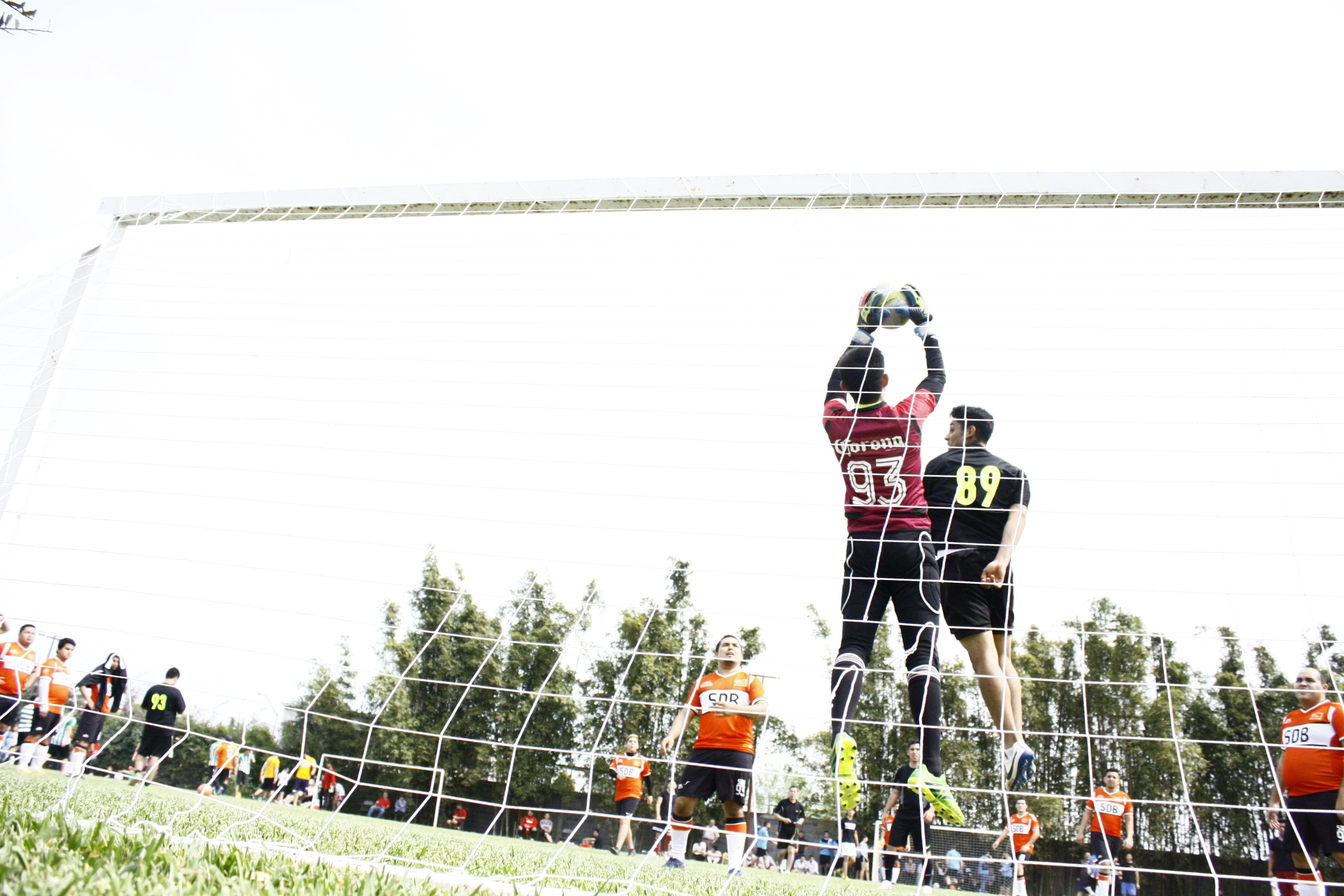 men, jump, game, football, built structure, nature, 4K, clear sky, day, sky, plant, gol, rear view, occupation, porter, people, standing, air, adult, tree, HD Wallpaper