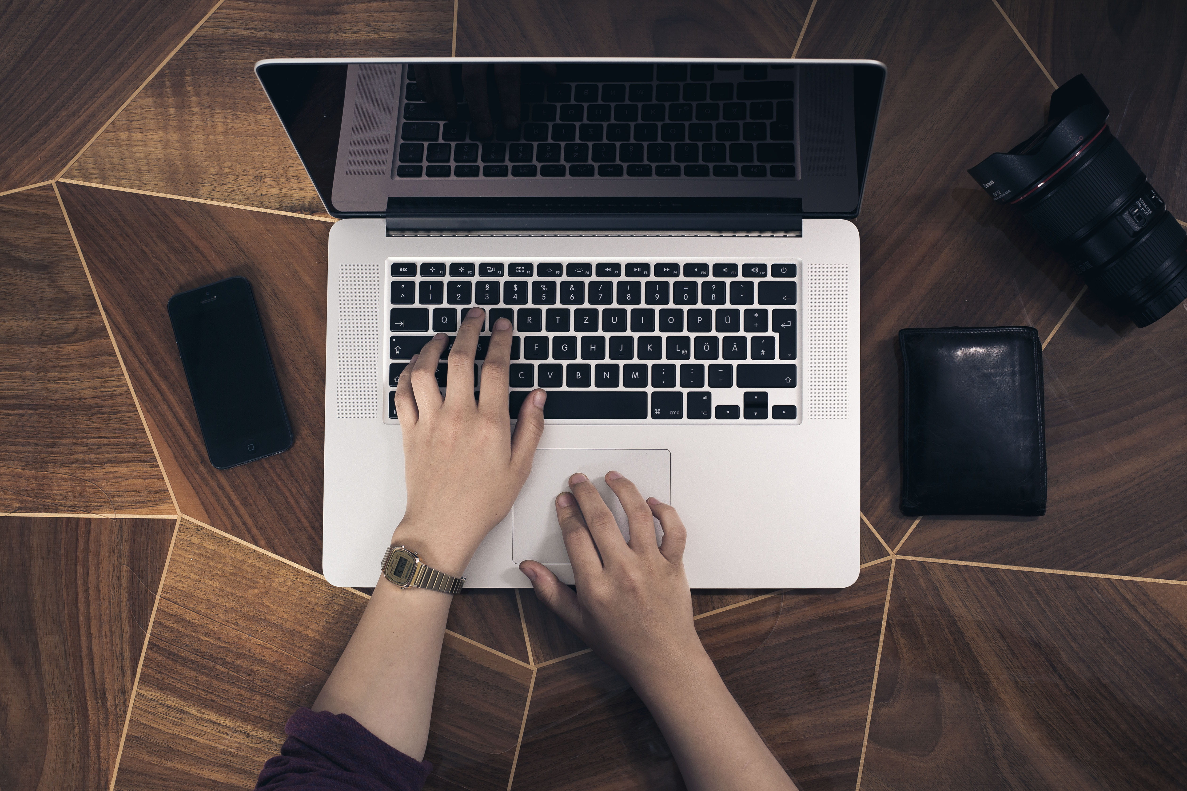 typing, 4K, using laptop, table, connection, holding, laptop, smartphone, using, wood - material, tabletop, one person, human body part, pro, wallet, communication, HD Wallpaper