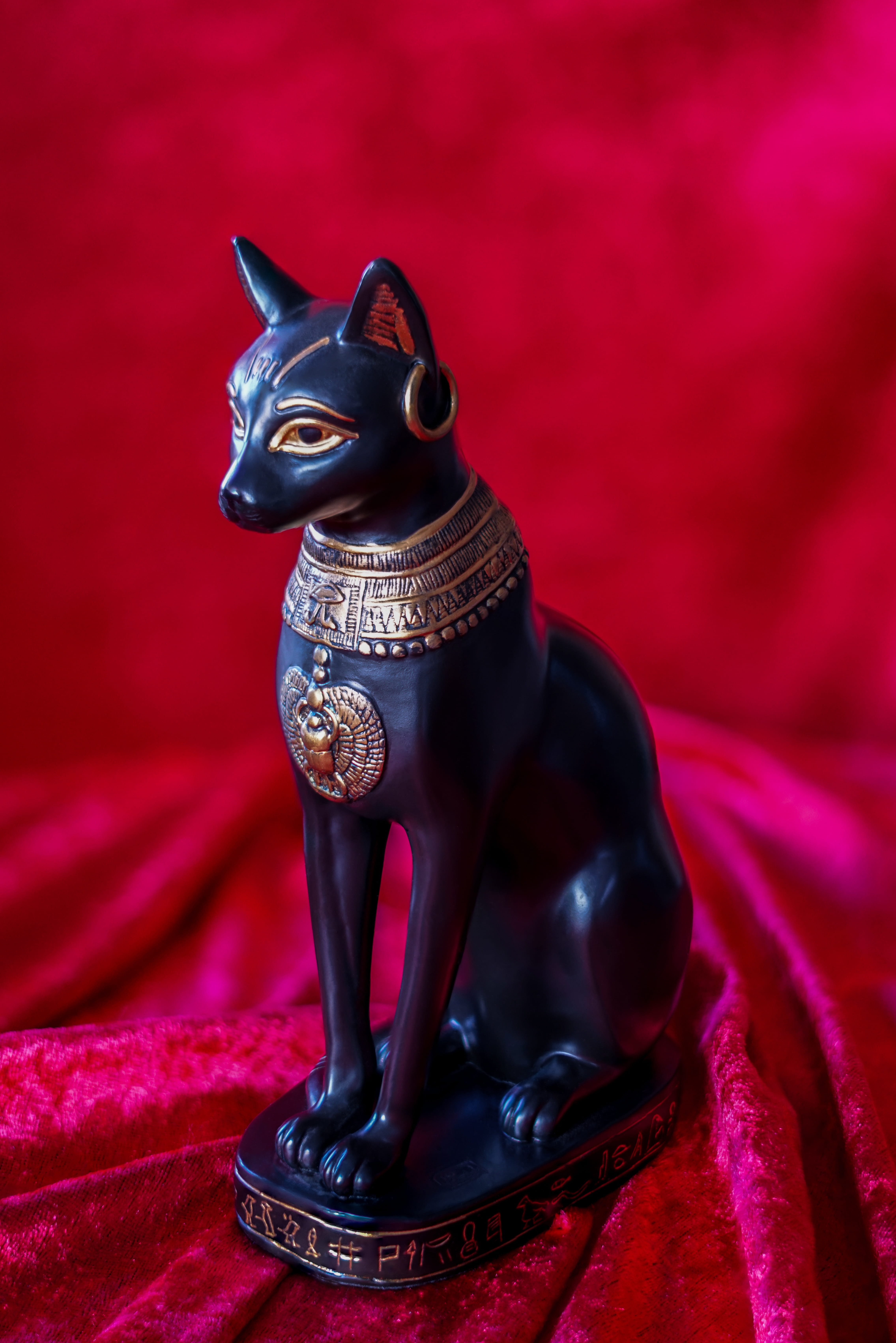 cat sculpture, 5K, egypt, craft, noble, ornate, sublime, close-up, religion, statue, symbol, egyptian cat goddess, indoors, red, florencia, art and craft, Phone HD Wallpaper