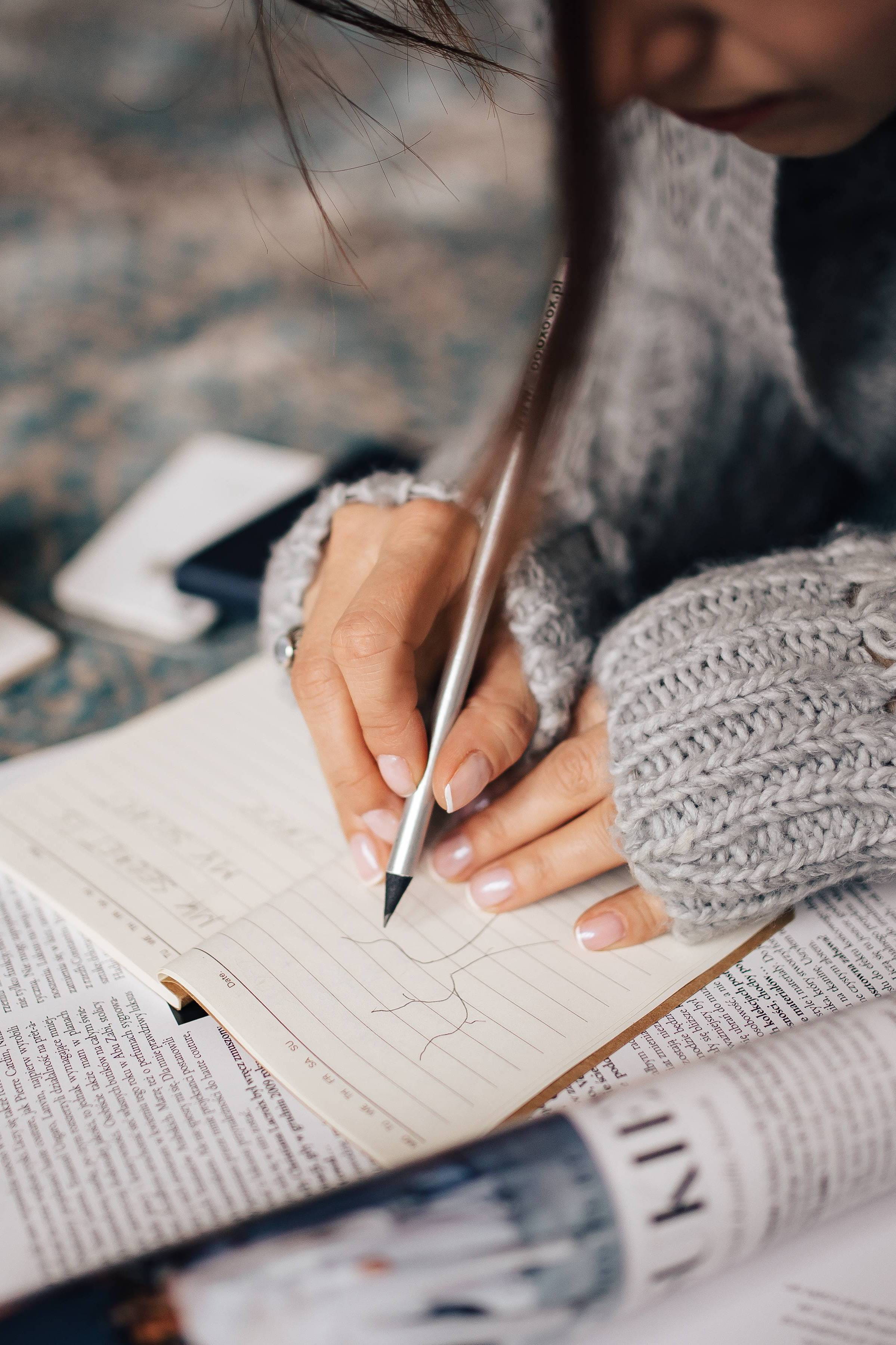 hand, one Person, art and craft, close-up, writing, publication, holding, creativity, human body part, sweater, Woman, notepad, only women, leisure activity, Phone HD Wallpaper