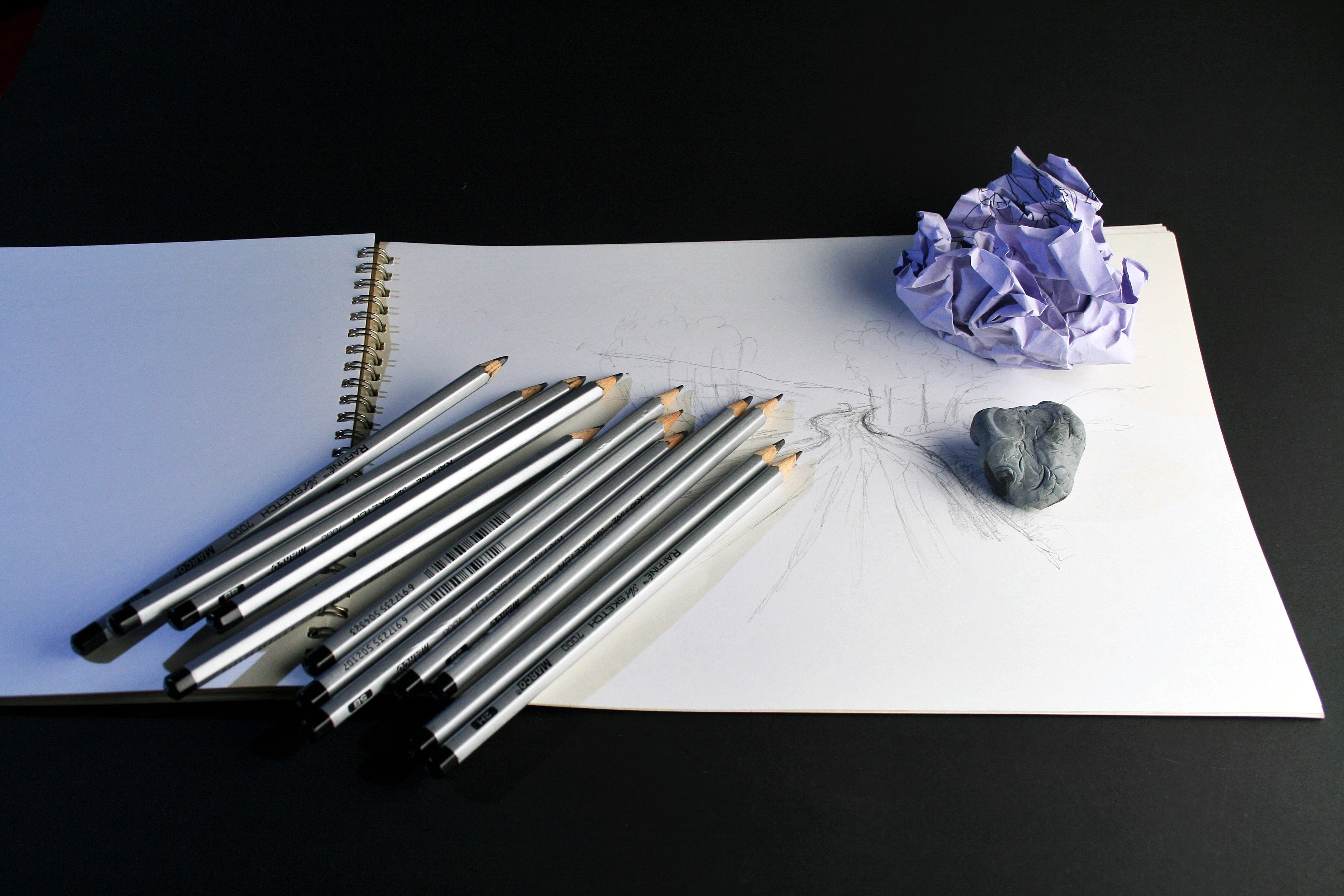black background, crumpled paper, frustration, group of objects, no people, pencils, high angle view, indoors, sketch pad, arrangement, table, art, silver colored, HD Wallpaper
