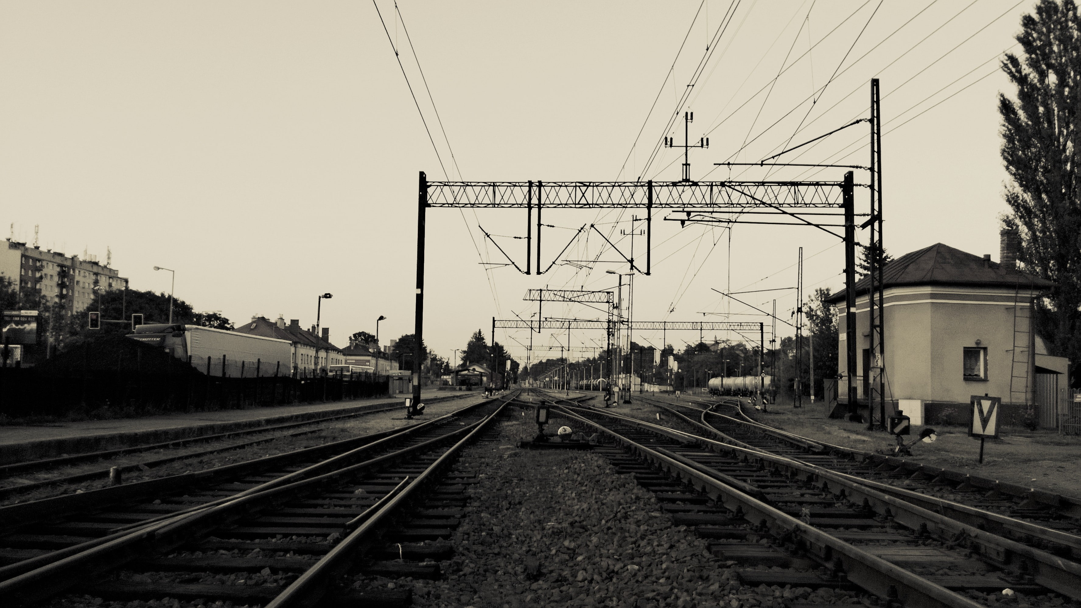 railway, clear sky, electricity, connection, rail transportation, sky, power line, direction, transportation, building, railroad track, city, urban, mode of transportation, HD Wallpaper