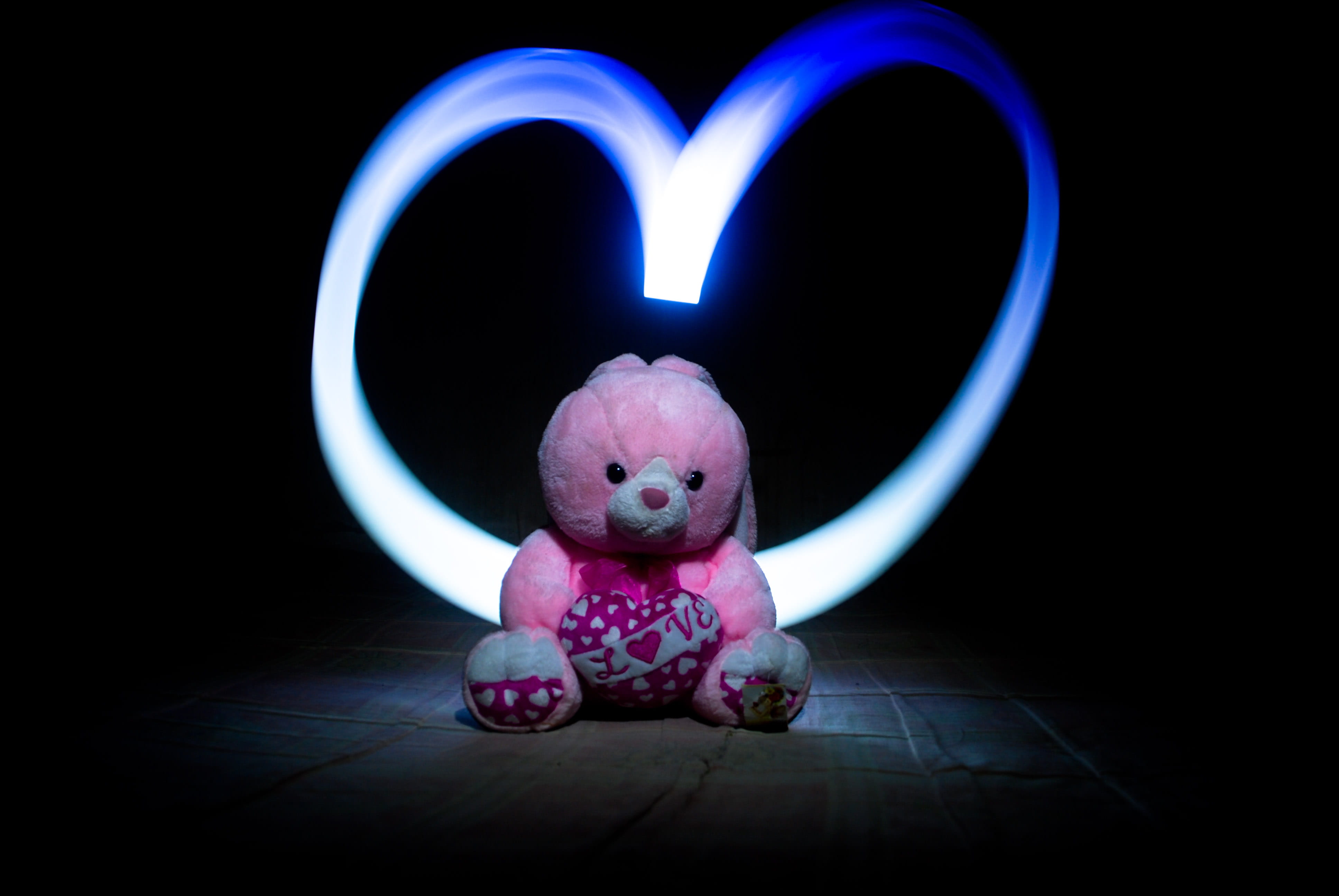 piggy bank, black background, heart, symbol, indoors, representation, pink color, shape, draw, light effect, positive emotion, stuffed toy, no people, artsy, HD Wallpaper