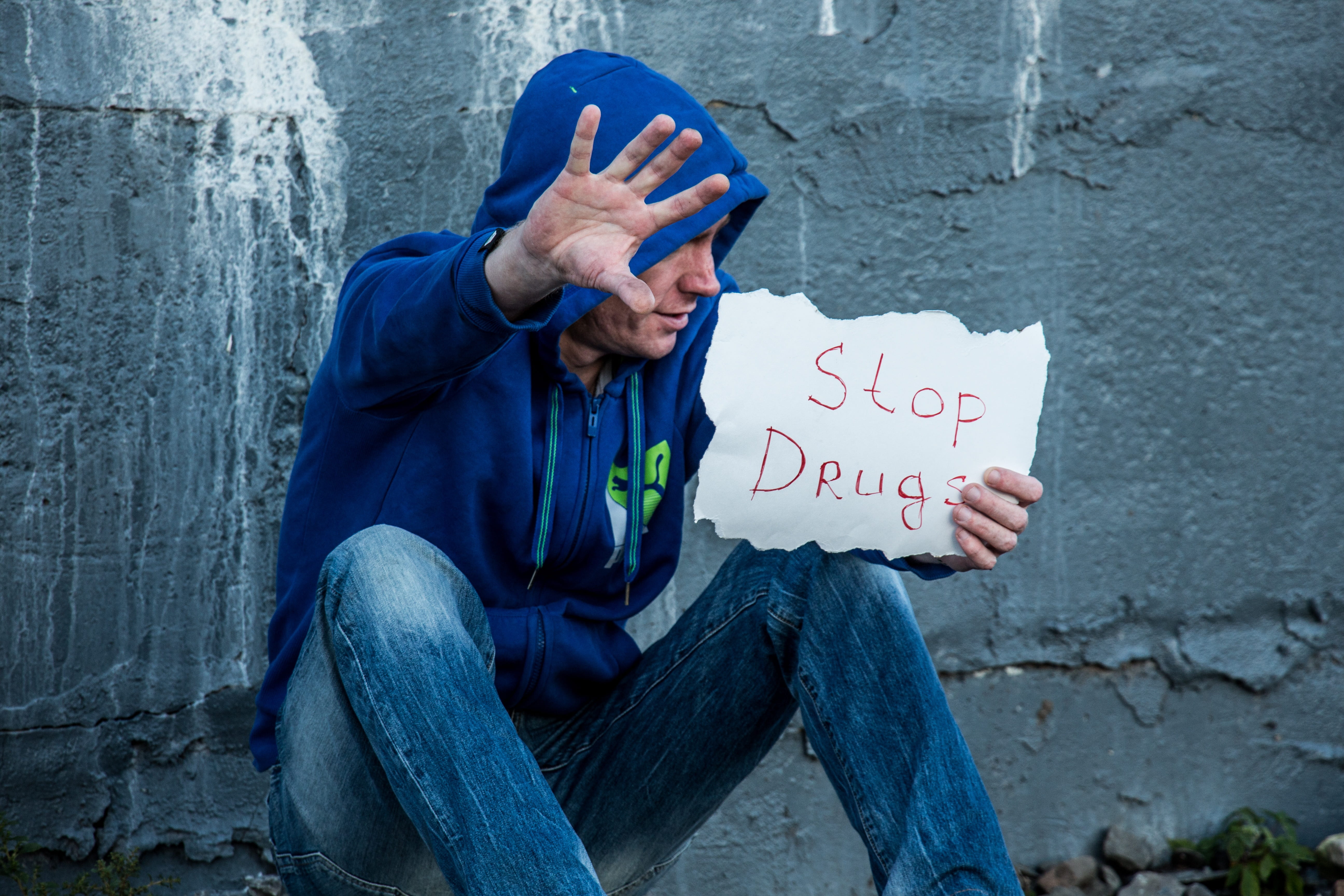 text, men, casual clothing, day, hopelessness, against drugs, drug addiction, drugs, hands, dependent, aids, man, drug dependence, wall, drug, western script, HD Wallpaper