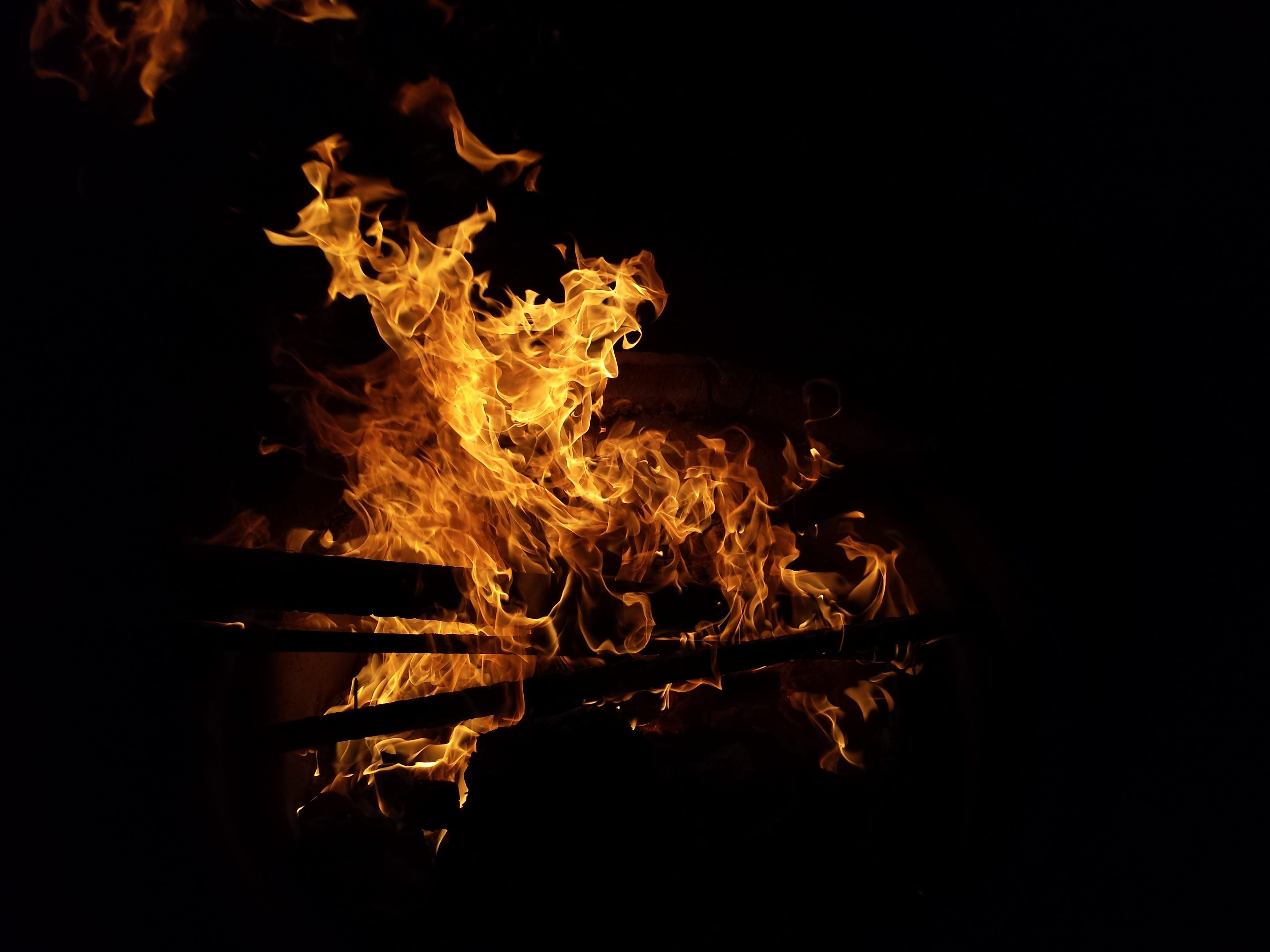 bonfire, camping, wood, nature, no people, glowing, black background, motion, campfire, black, fire - Natural Phenomenon, inferno, dark, yellow, Outbreak, HD Wallpaper