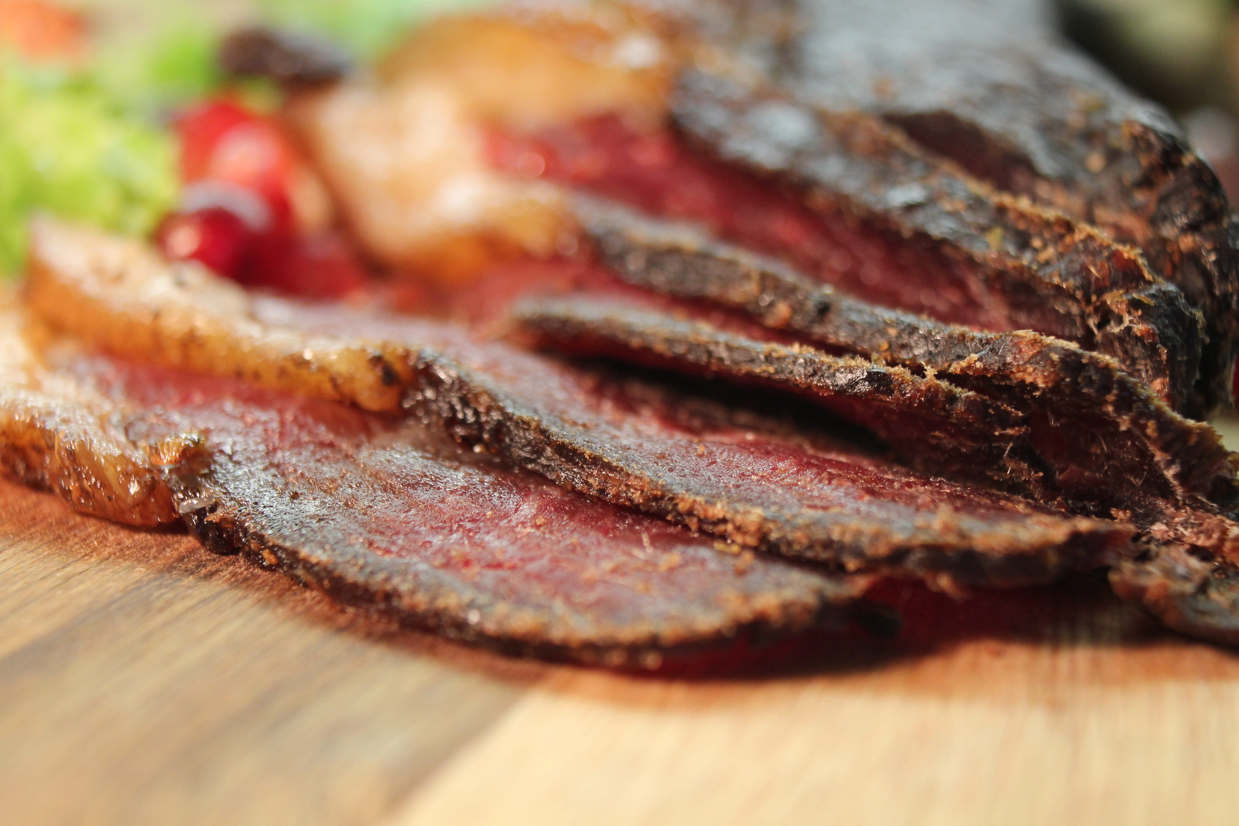 red meat, moist, biltong, raisins, fruit, meat, indoors, food, brown, wood - material, freshness, cutting board, selective focus, board, healthy eating, HD Wallpaper