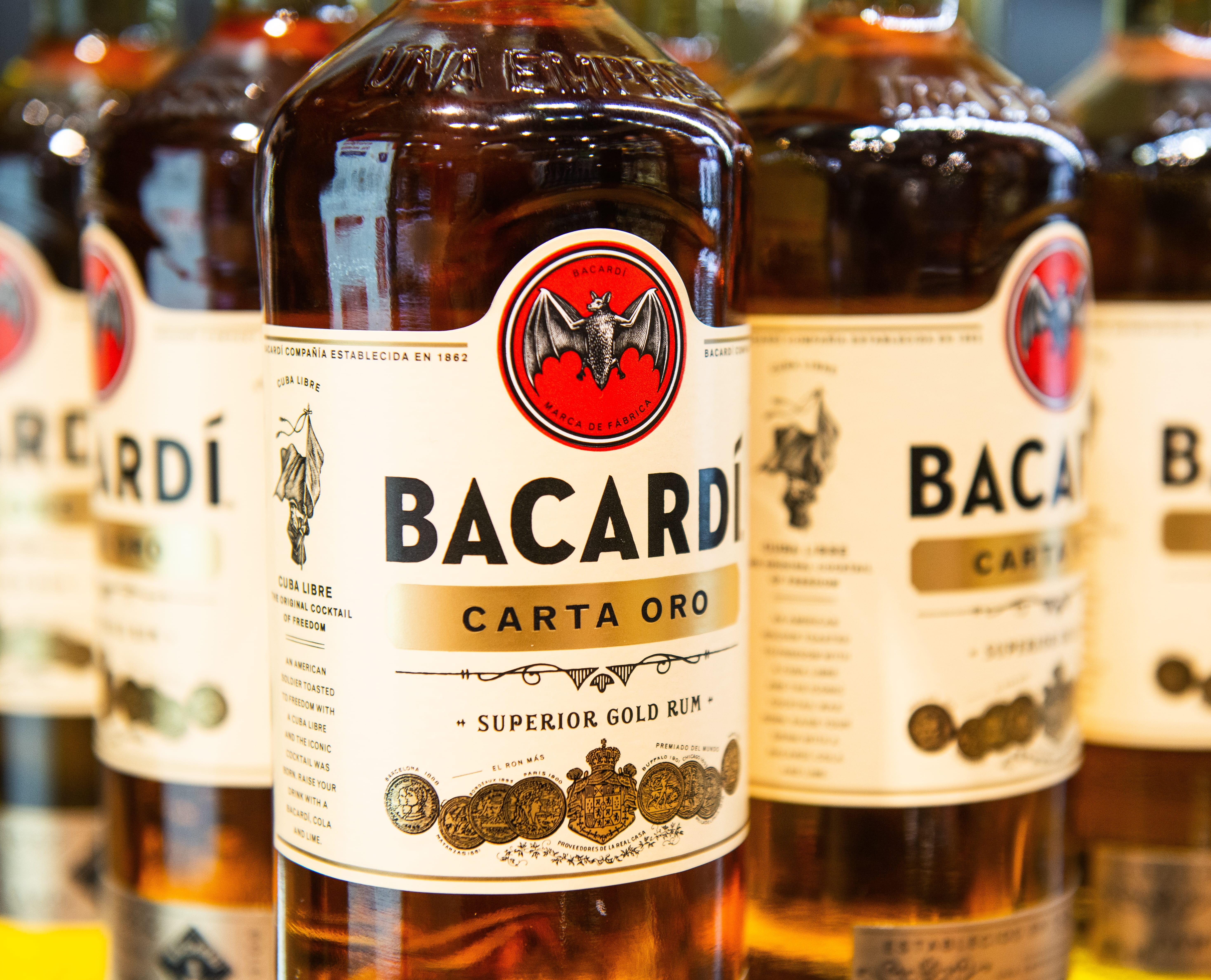 no people, container, rum, drink, focus on foreground, still life, close-up, oro, food, bottles, food and drink, gold, label, bacardi, indoors, jar, alcohol, HD Wallpaper