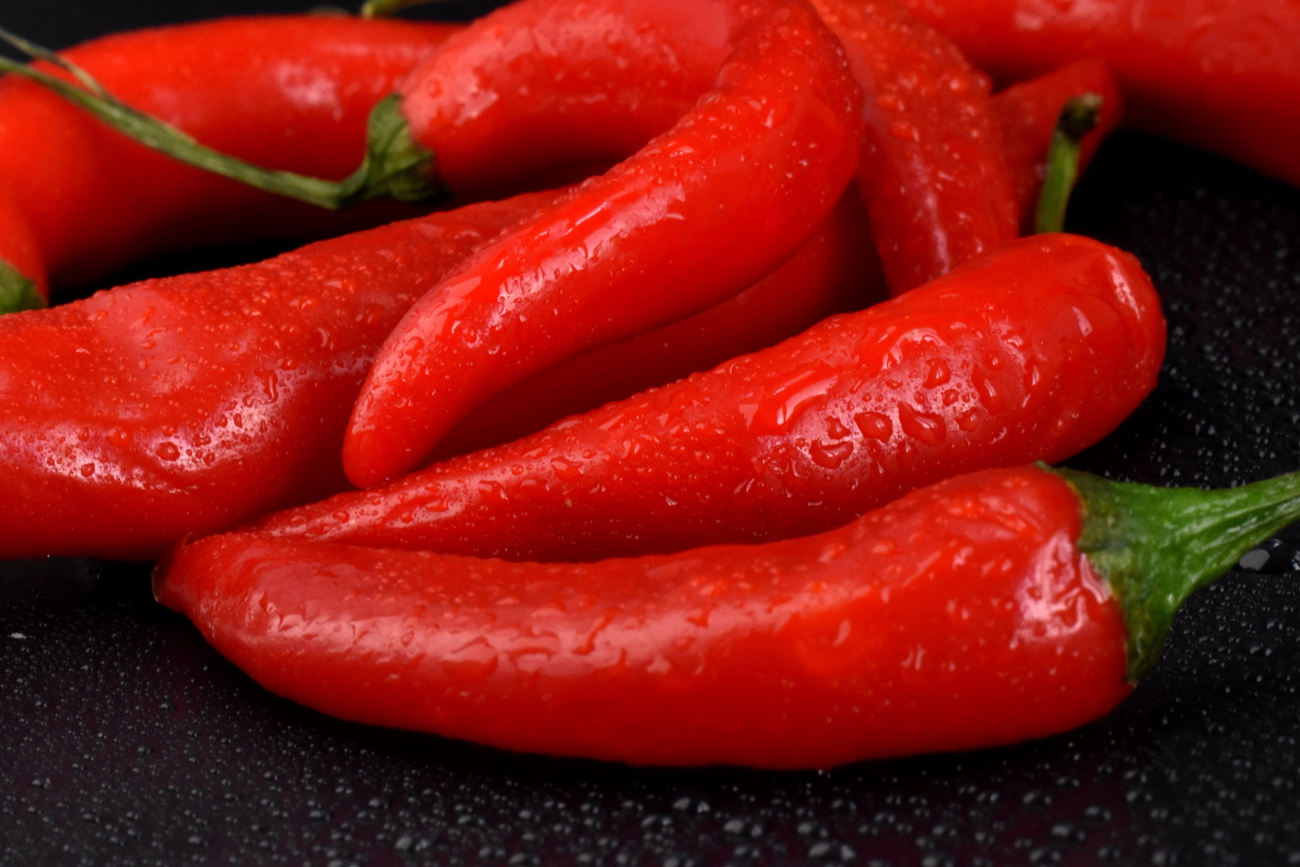 red, chile, close-up, food and drink, chili pepper, black background, vegetarian food, no people, freshness, organic, food, studio shot, raw food, pepper - vegetable, HD Wallpaper