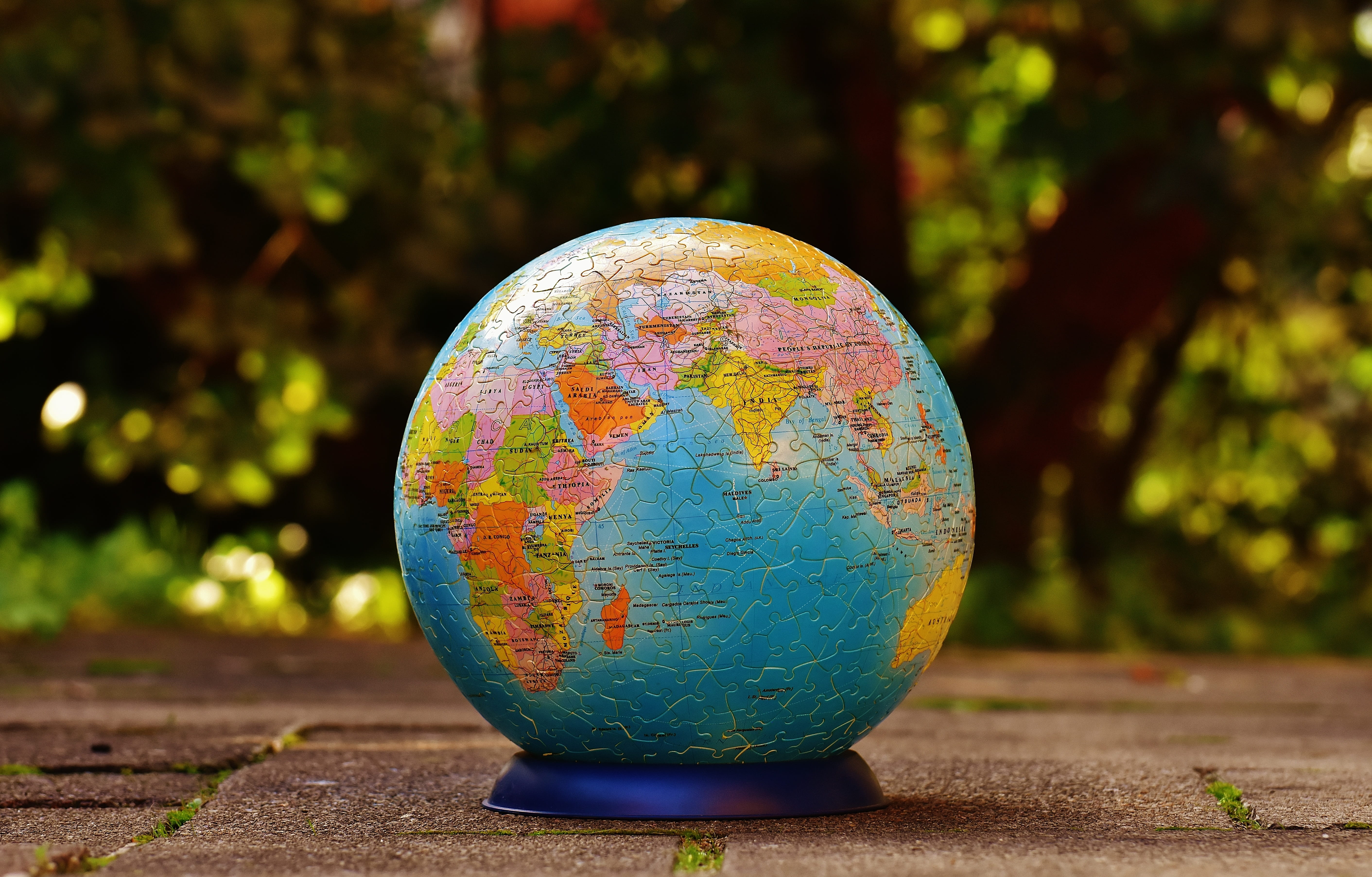planet earth, play, sunlight, puzzle piece, focus on foreground, 5K, globe, map, travel, tricky, space, sphere, photography, plant, desk, road, patience games, HD Wallpaper