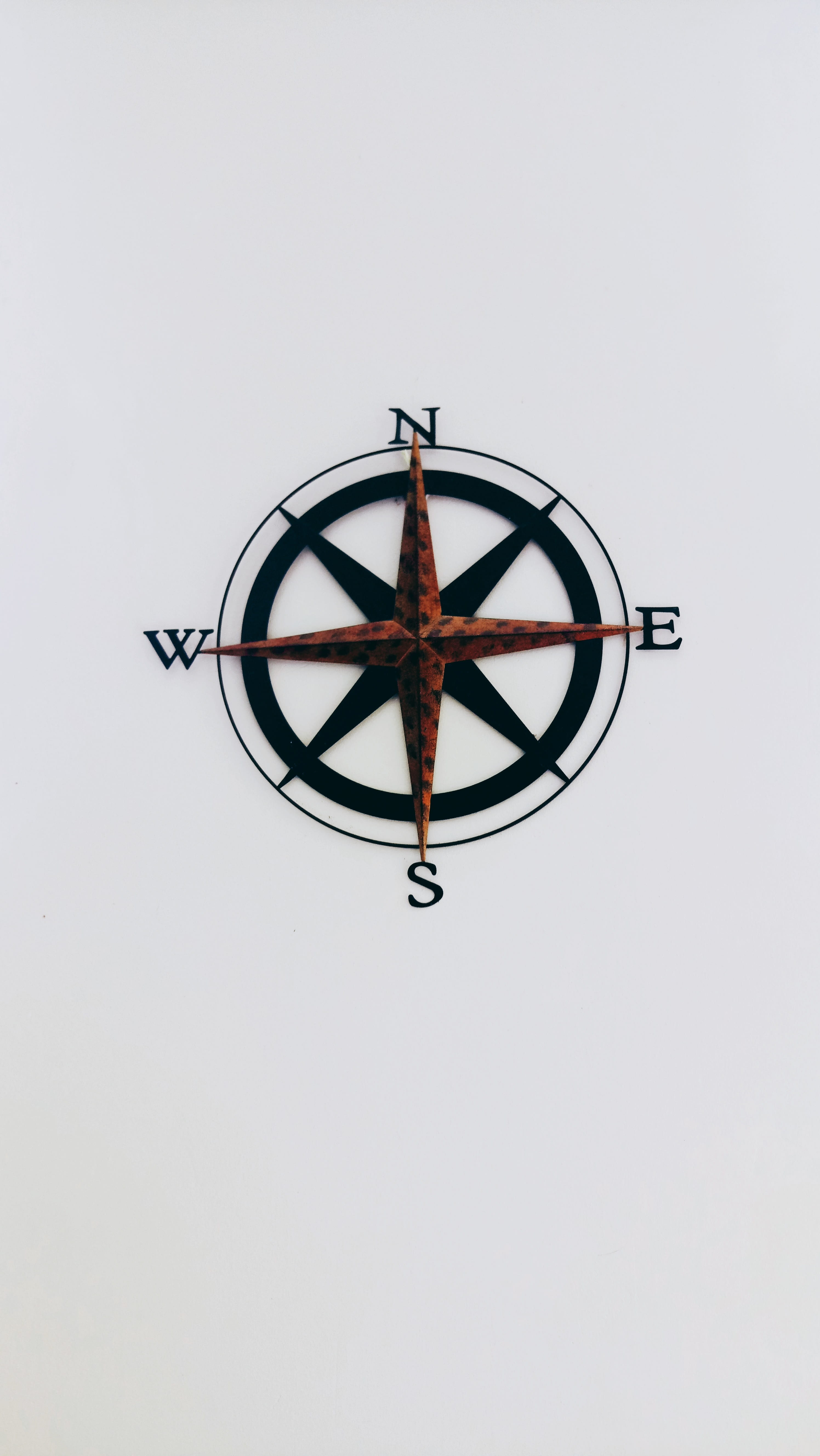 old, low angle view, indoors, white background, wheel, west, compass, 5K, decor, built structure, clear sky, geometric shape, wall - building feature, Phone HD Wallpaper