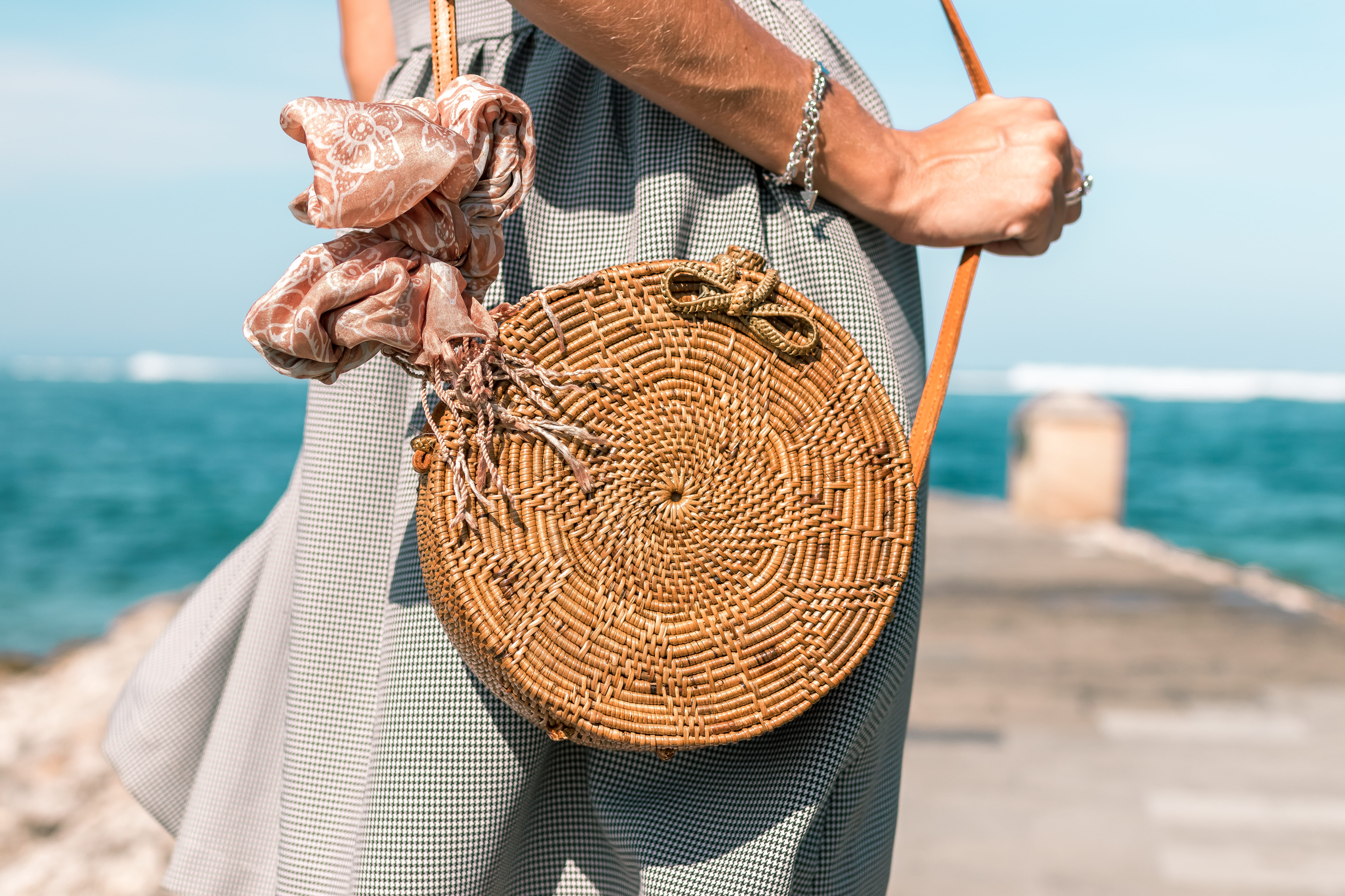 sea, holding, bracelet, horizon over water, handbag, dock, beauty, seashore, accessory, 5K, hand, fashionable, brown, purse, horizon, rattan, beautiful, HD Wallpaper