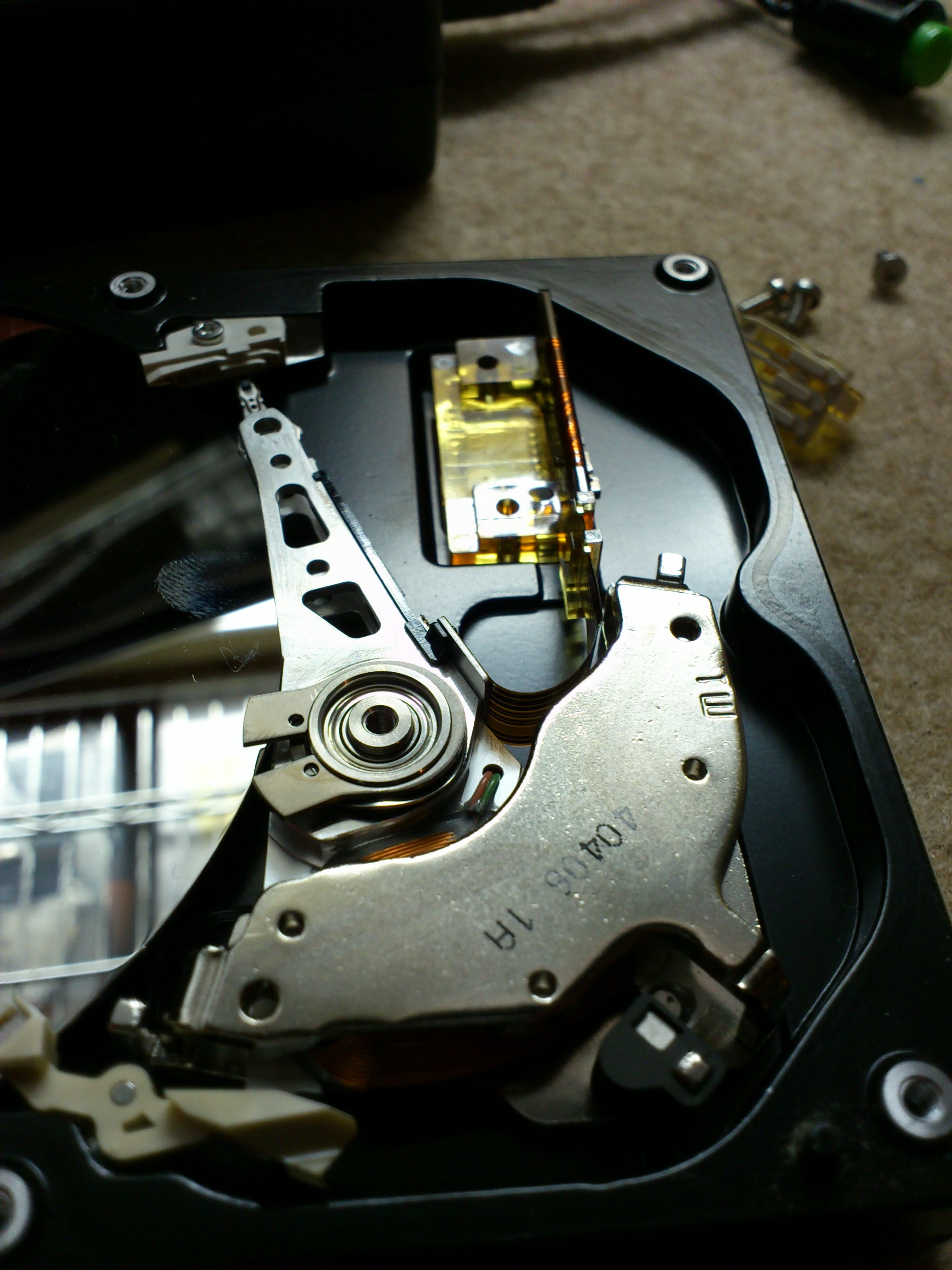 gun, computer part, decomposition, hard disk, machinery, repair, machine part, no people, close-up, head, computer equipment, cylinder, 2K, metal, motor, Phone HD Wallpaper