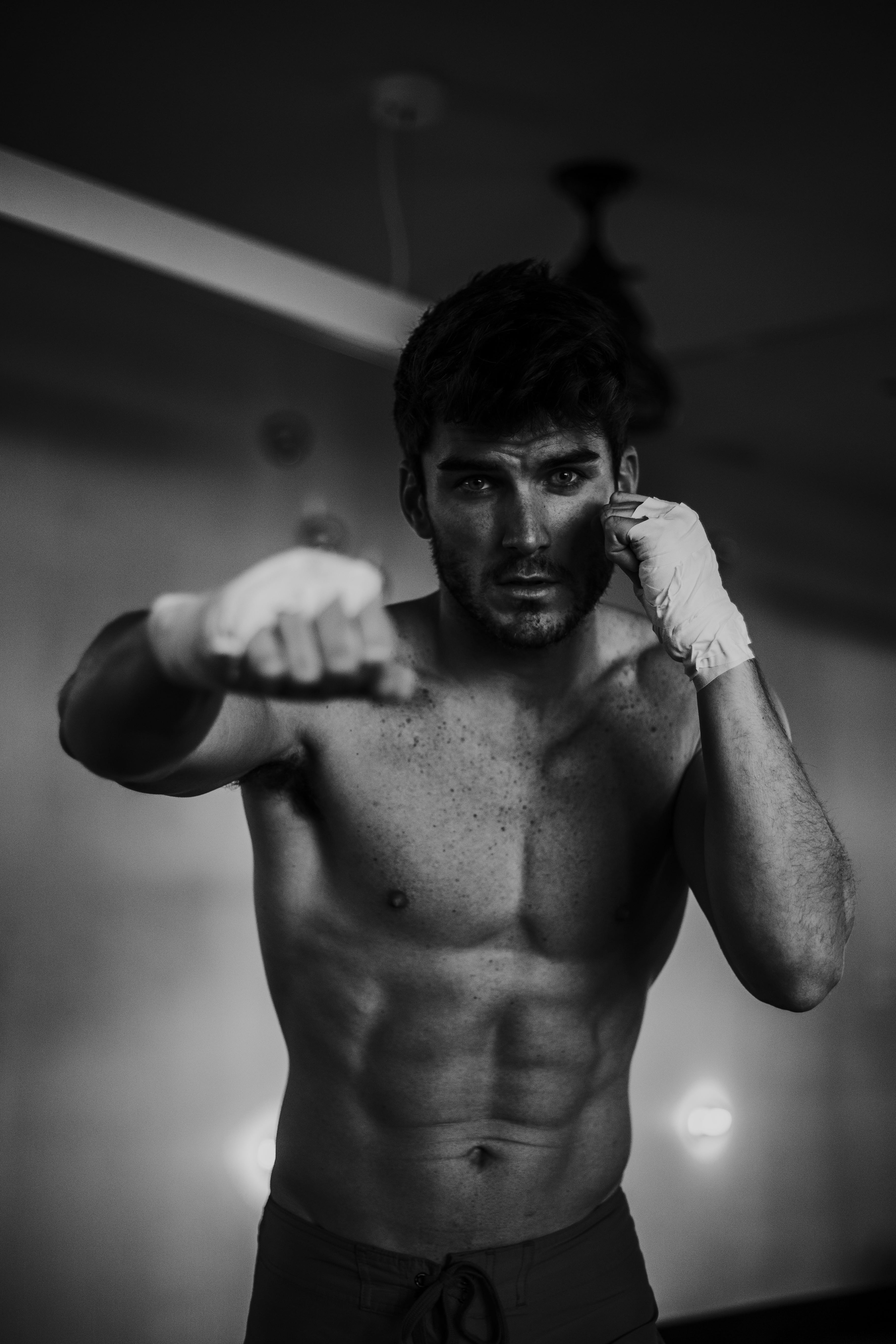 throwing a punch, room, masculinity, abdominal muscle, confidence, fitness, male, sport, human muscle, handsome, standing, training, photo, athletic, one person, Phone HD Wallpaper