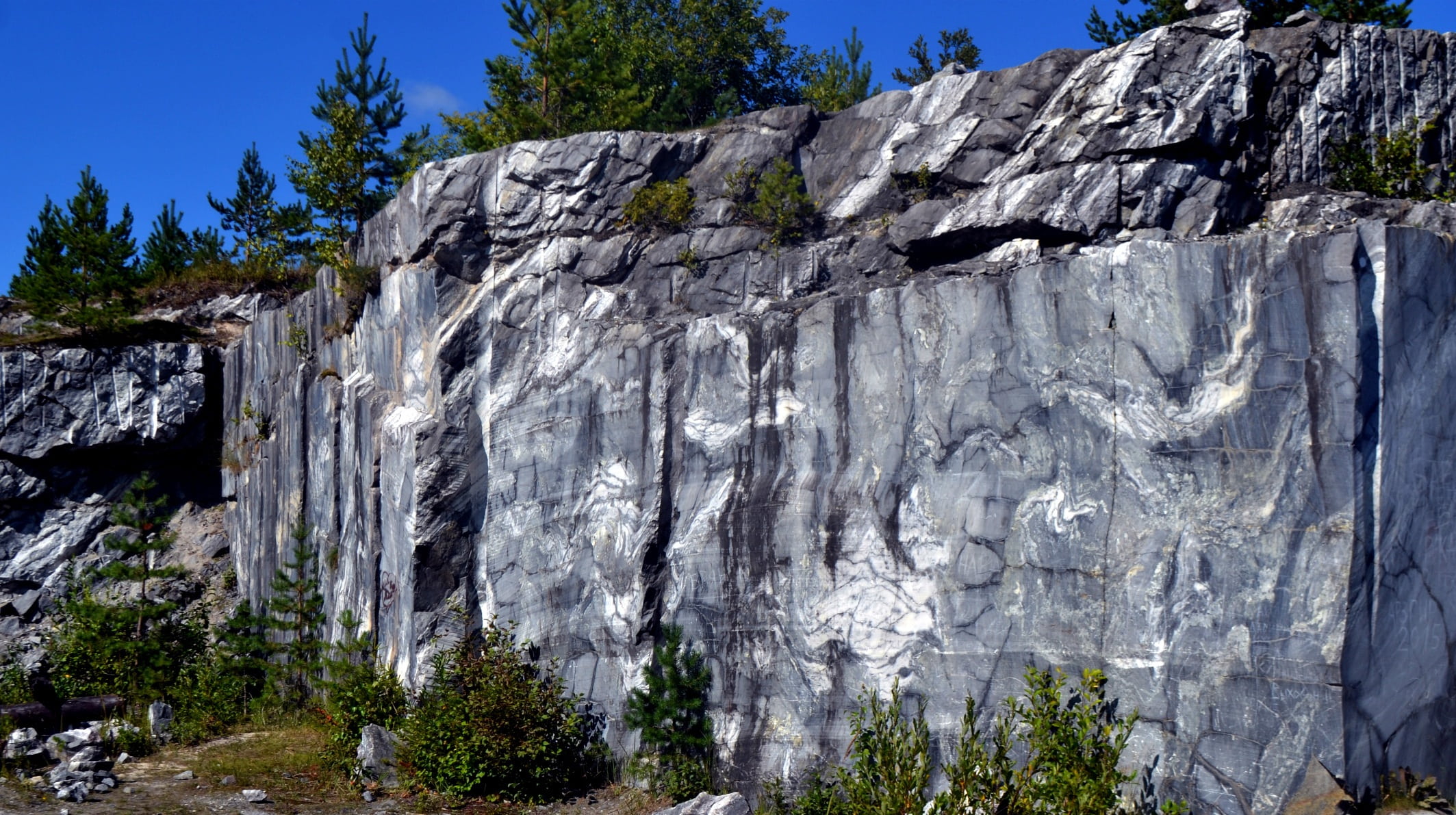 cliff, grey, marble quarrying, steep, pine tree, solid, non-urban scene, coniferous tree, land, nature, blue sky, journey, trees, beauty in nature, geology, HD Wallpaper