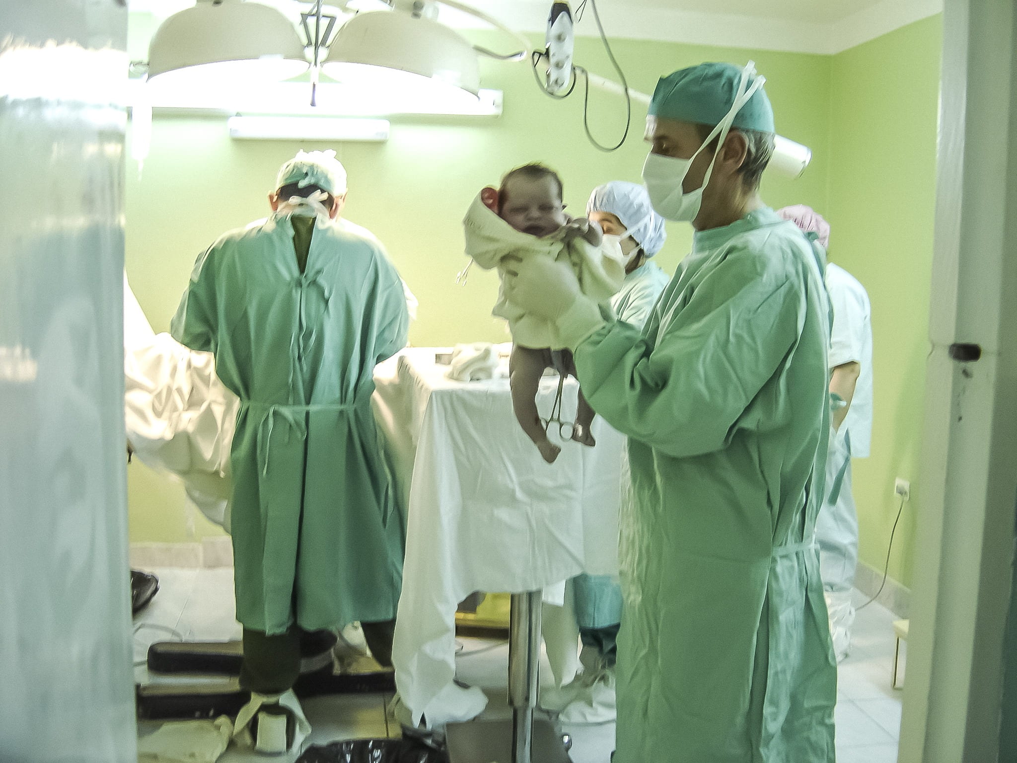 responsibility, group of people, holding, adult, pediatric, men, medical, baby, surgical cap, inside, surgical mask, room, indoors, hospital, mature men, HD Wallpaper