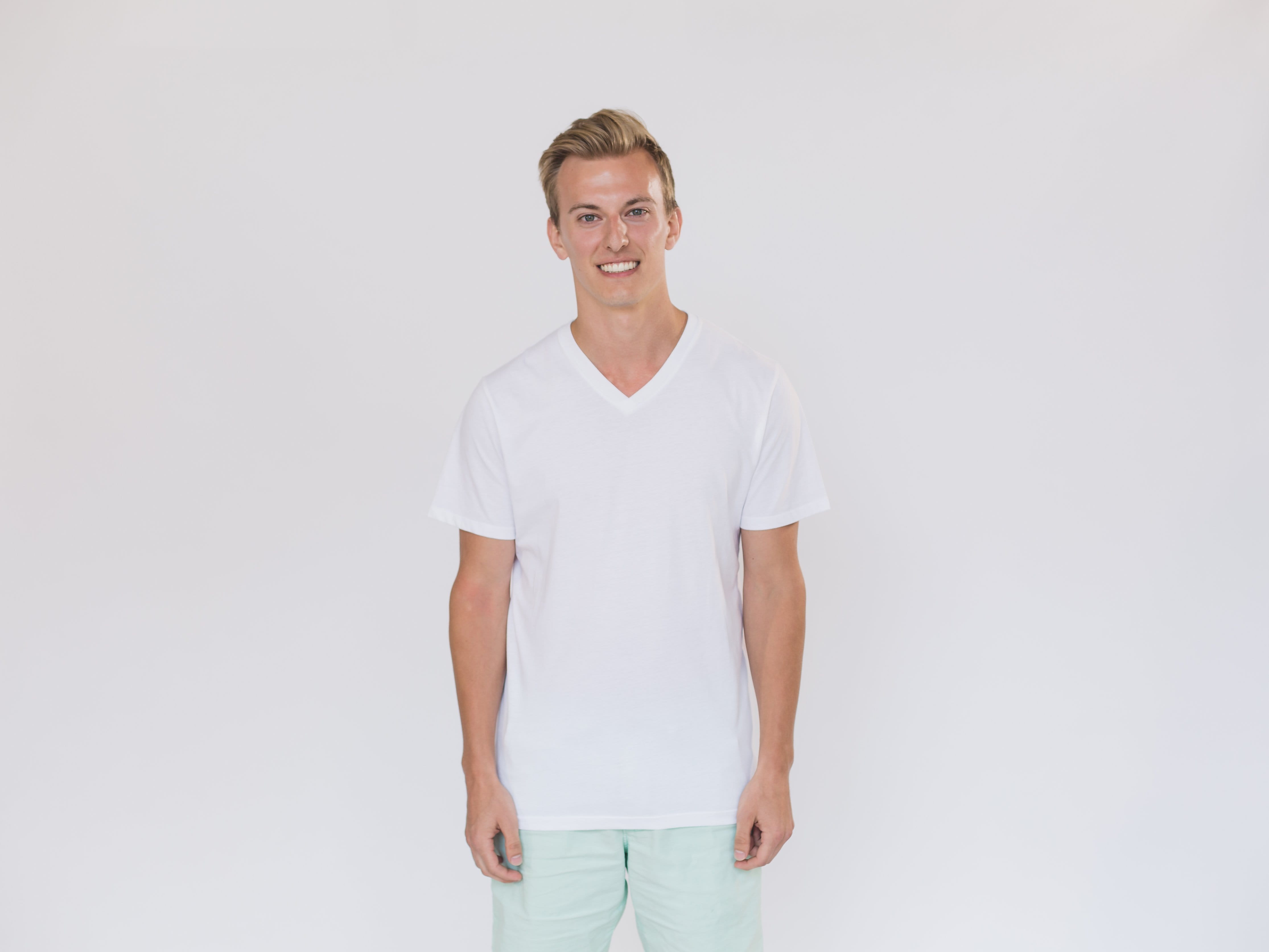 white background, casual clothing, front view, Clothes, hair, tshirt, emotion, confidence, smiling, standing, portrait, blond hair, one person, studio shot, HD Wallpaper