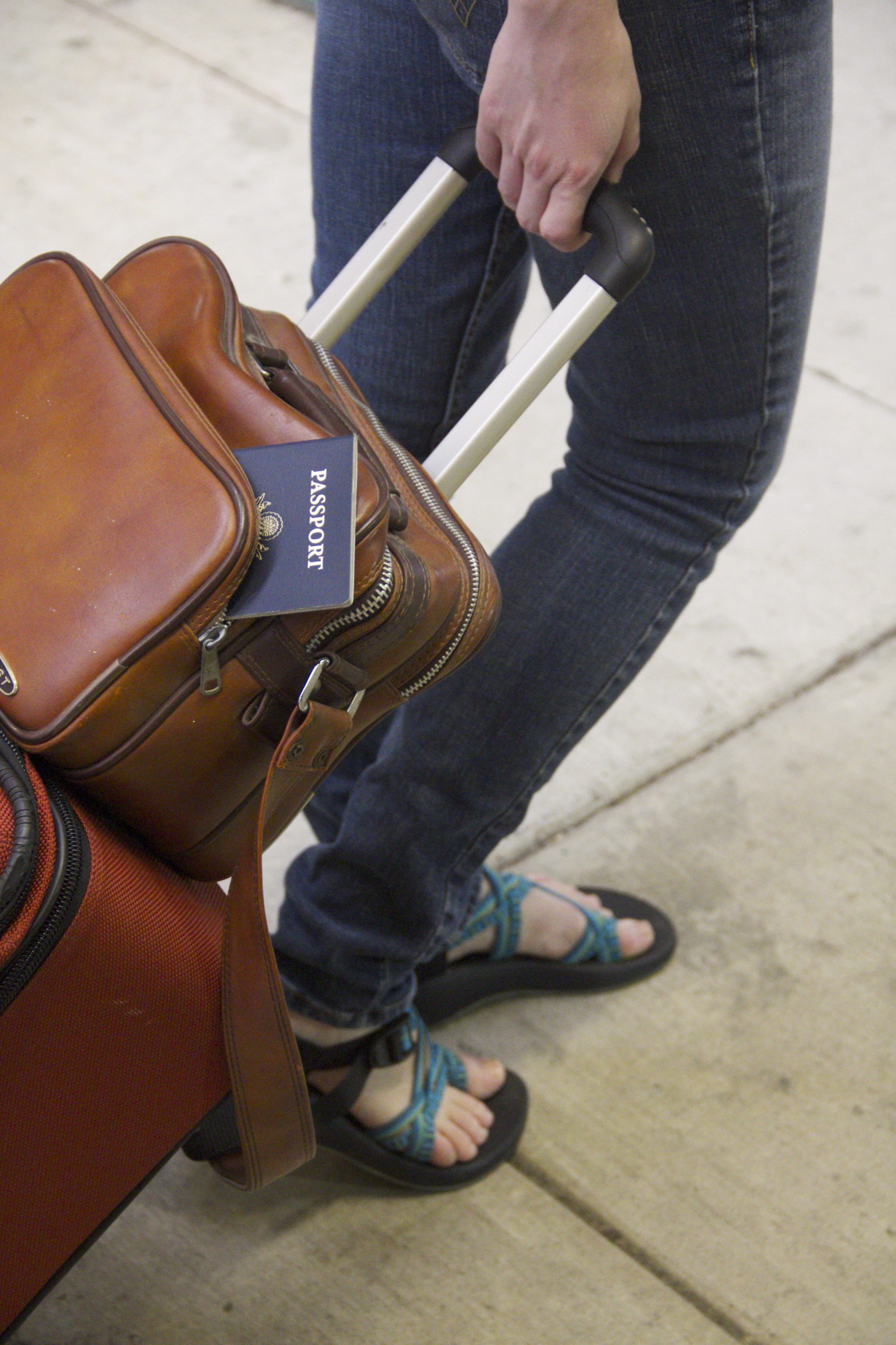 journey, flight, shoe, leather, passport, holding, tiled floor, jeans, men, flooring, low section, human foot, travel, high angle view, luggage, focus on foreground, Phone HD Wallpaper