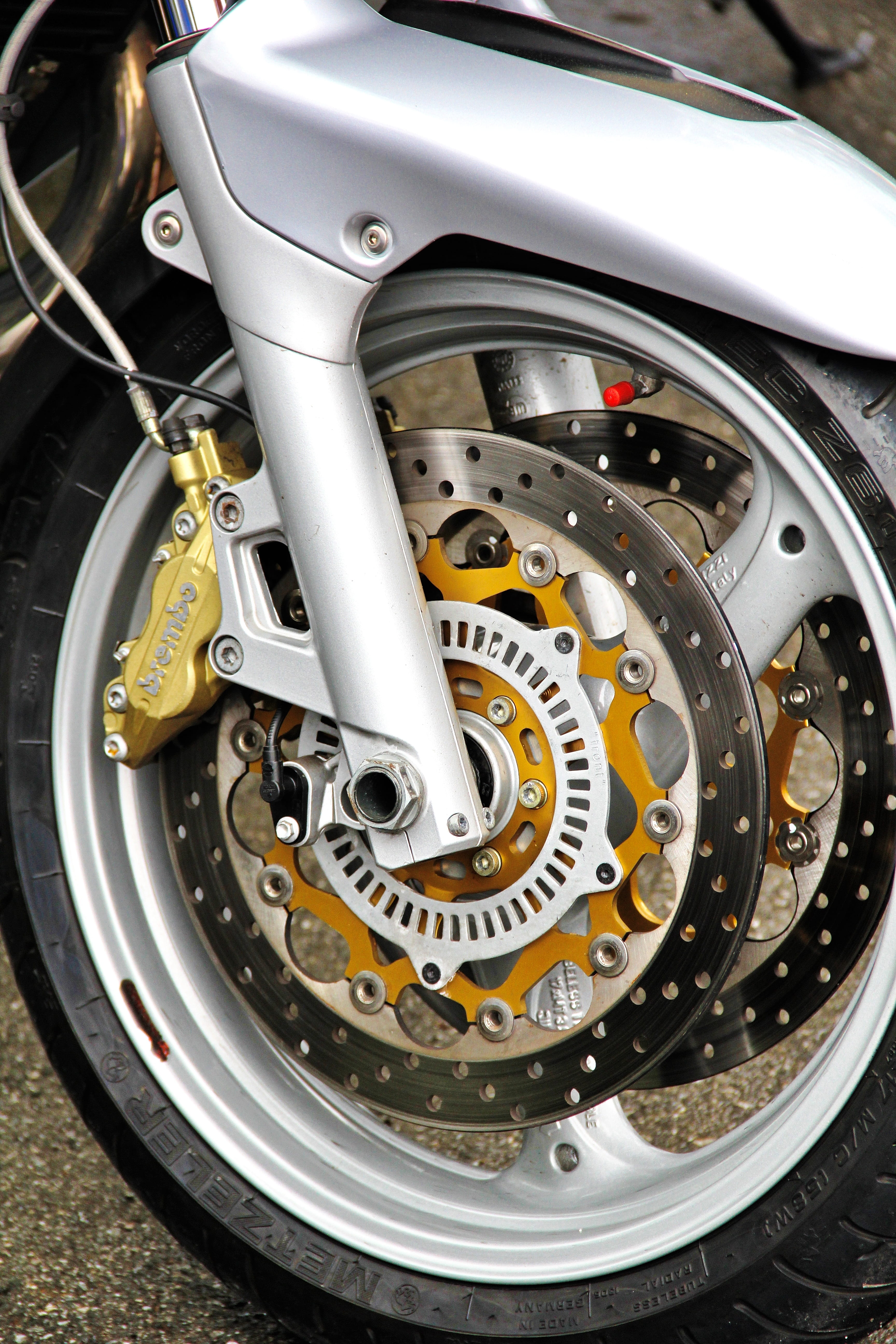 two wheeled vehicle, caliper, machinery, silver colored, steel, motorsport, chrome, brake disc, equipment, wheel, no people, vehicle, high angle view, machine part, Phone HD Wallpaper