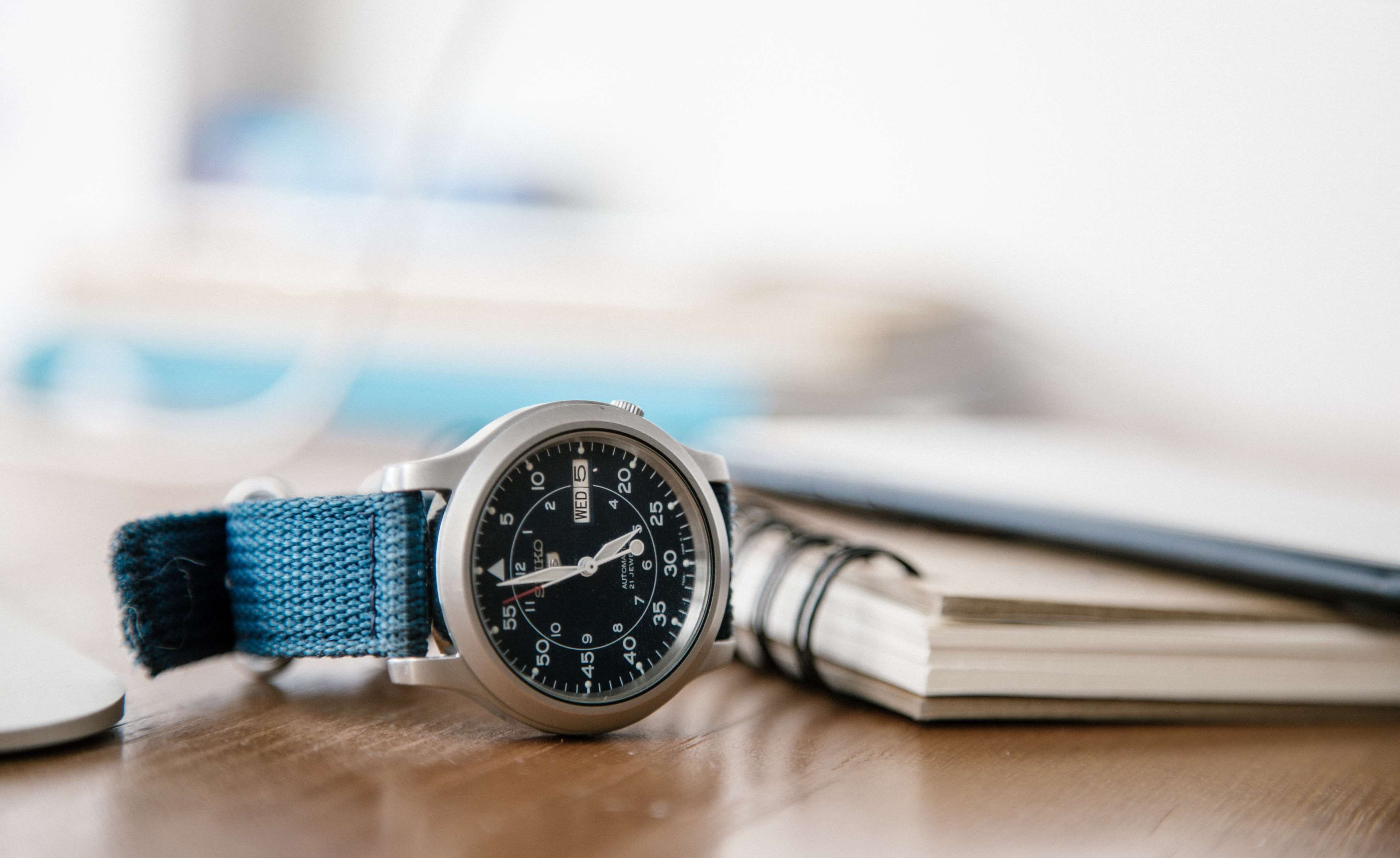examining, still life, close up, studio shot, time, indoors, 4K, healthcare and medicine, notebook, wristwatch, close-up, copy space, stopwatch, book bindings, HD Wallpaper