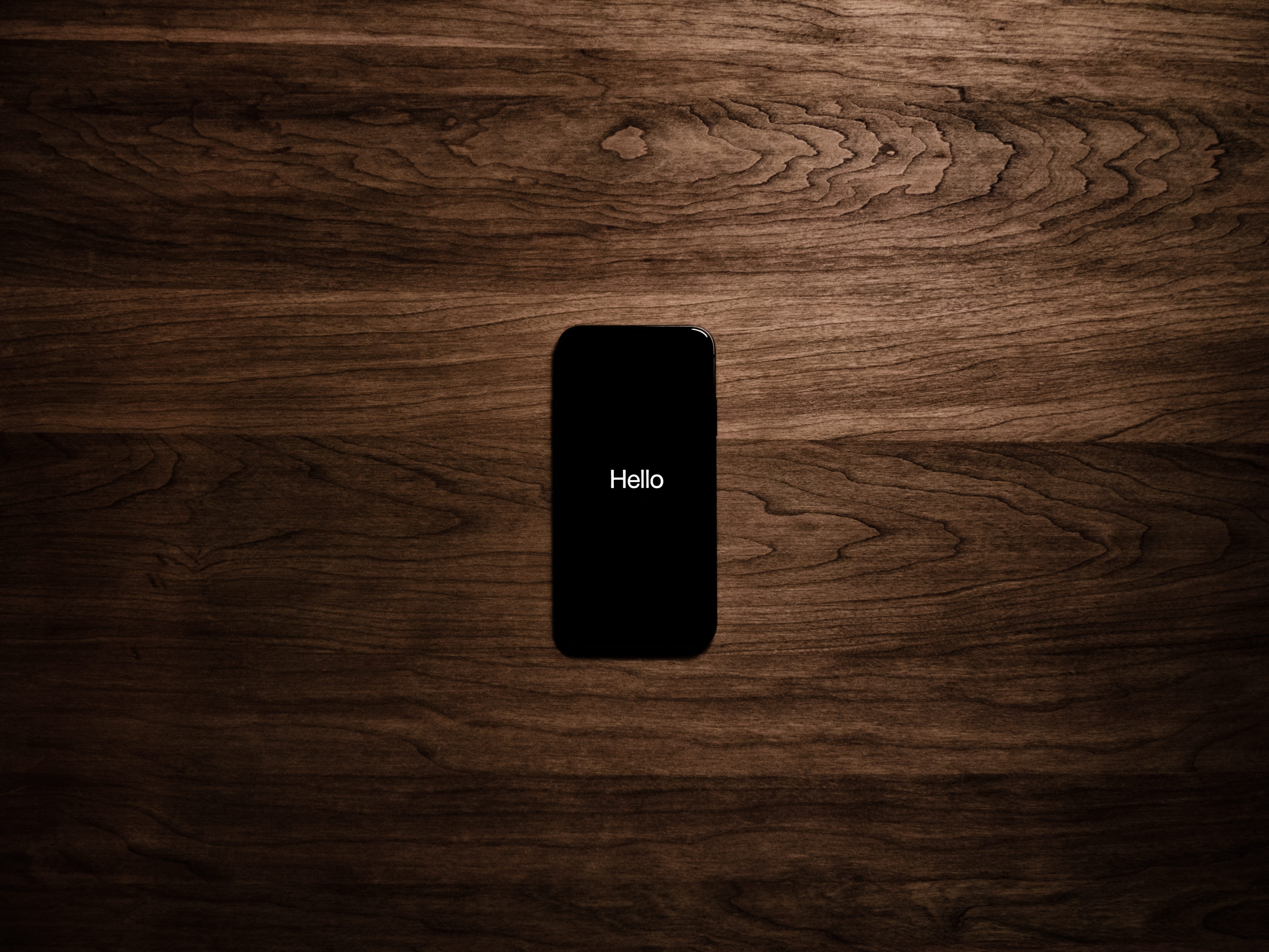 still life, wood, phone, close-up, simple, pattern, iphone, brown, surface, device, simplicity, iPhone X, 4K, communication, black color, turned, black, HD Wallpaper