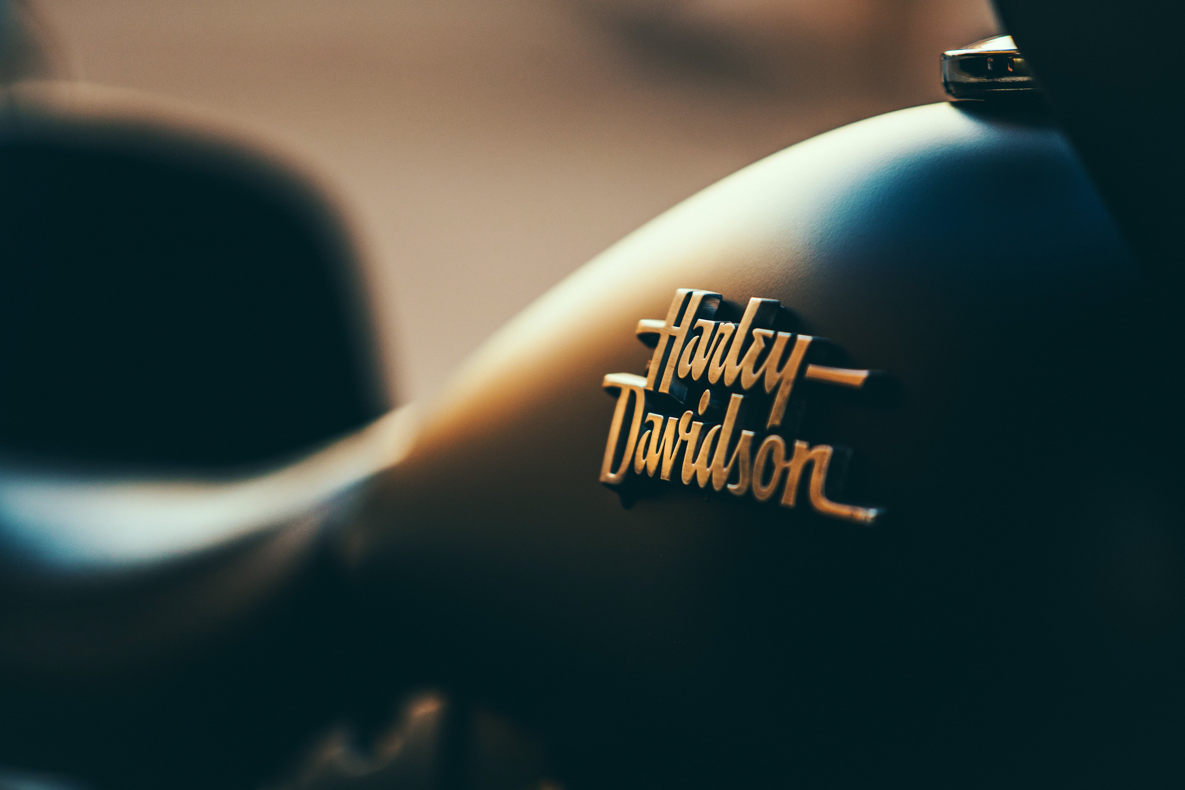 music, single object, harley, logo, 4K, blue, body part, photography, davidson, audio equipment, selective, finger, string instrument, motorcycle, human hand, HD Wallpaper