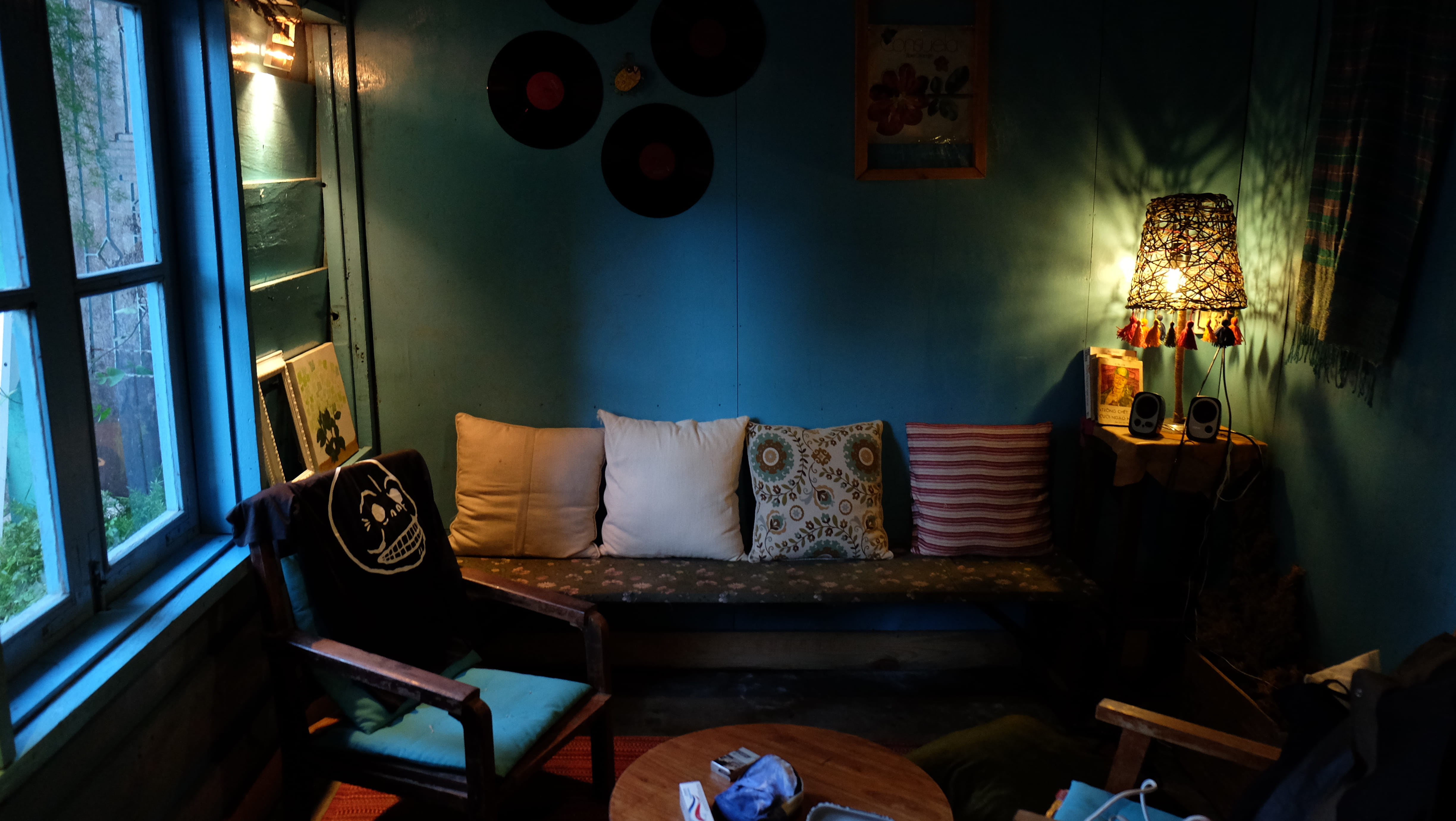 living room, illuminated, indoors, cabin, frame, electric lamp, lighting equipment, seat, side table, picture frame, table, domestic room, absence, wall - building feature, HD Wallpaper