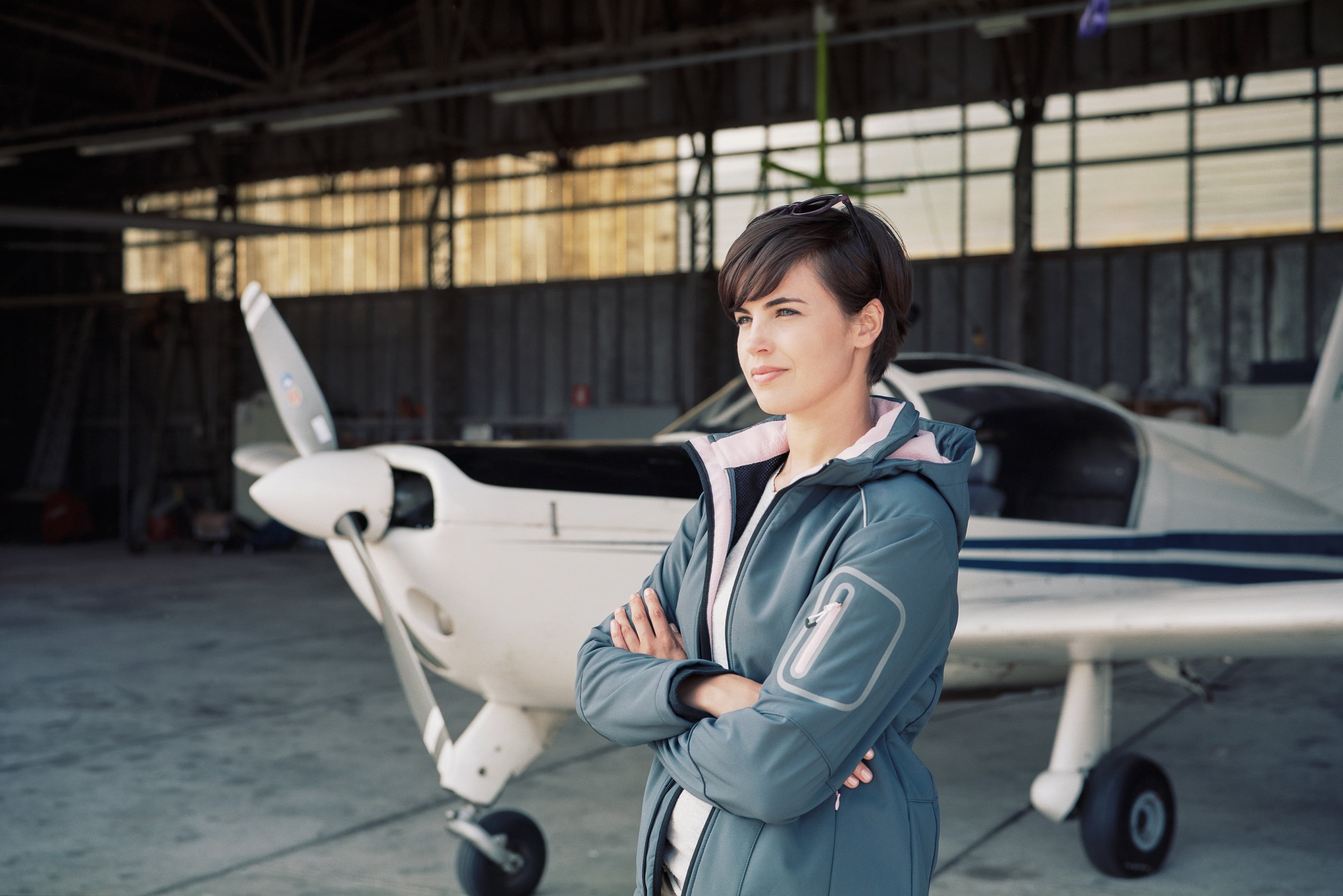 summer, style, adult, standing, bokeh, single-engine aircraft kitplanes, transportation, hairstyle, s, one person, formalwear, jacket, smile, confidence, HD Wallpaper